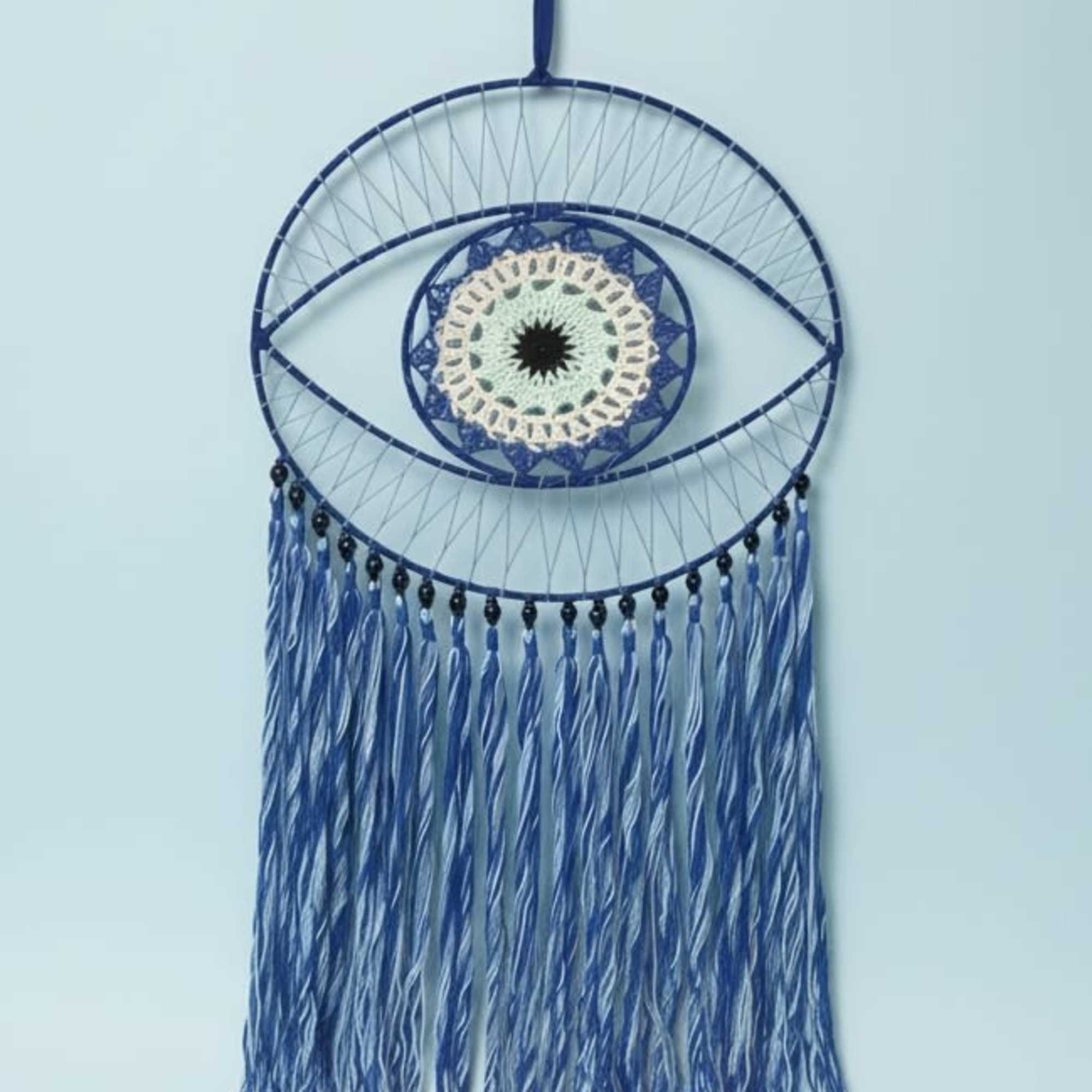 Bright, artful, and slightly bohemian-this flower arrangement and wall-hanging bundle makes a