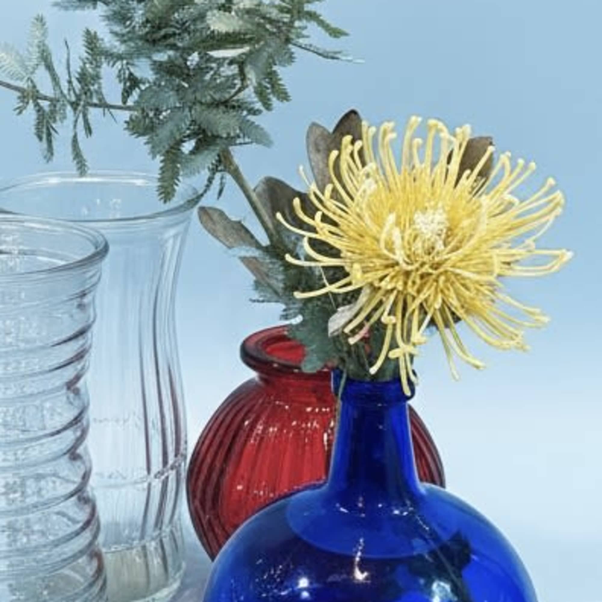 Bright, artful, and slightly bohemian-this flower arrangement and wall-hanging bundle makes a