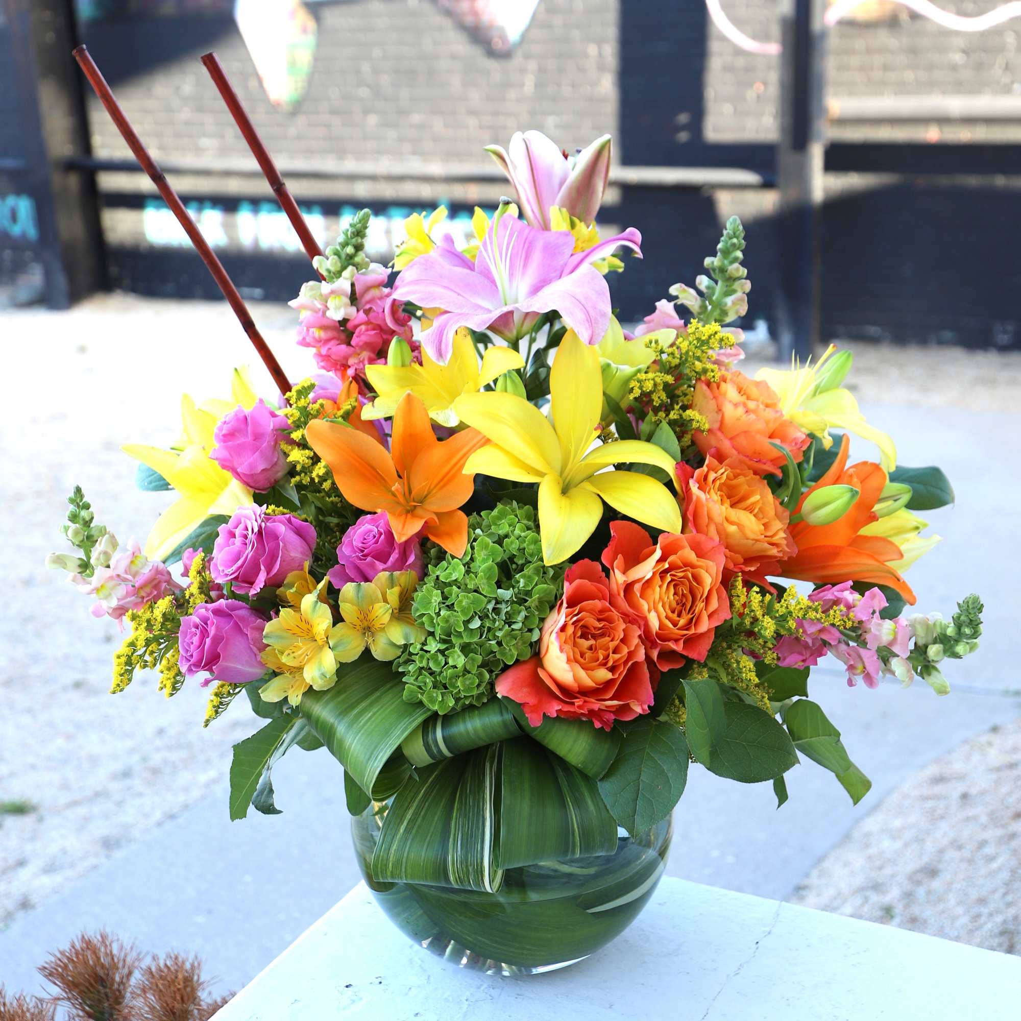 Colorful mixed bouquet in a clear glass vase