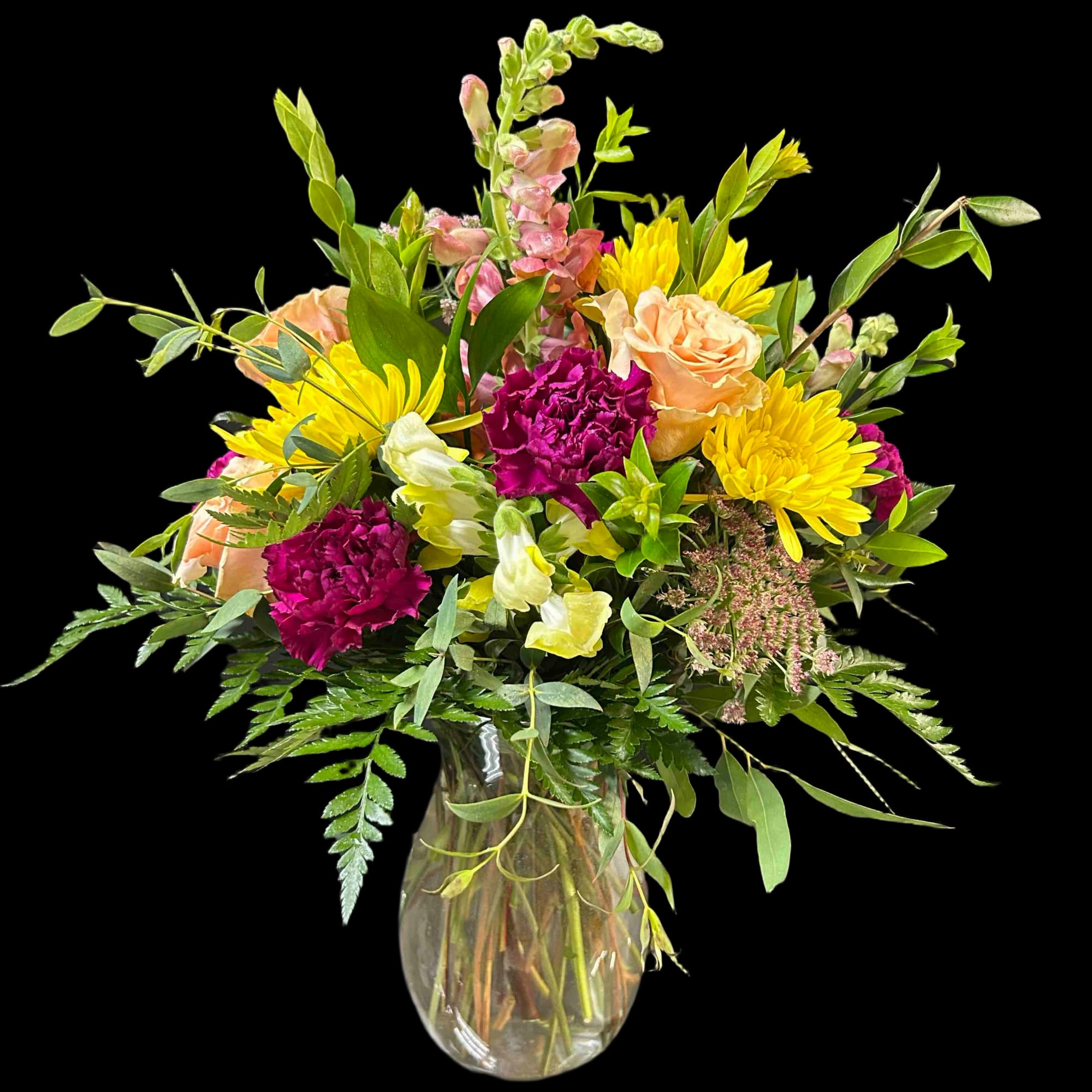 Fun mix of peach, purple and yellow flowers