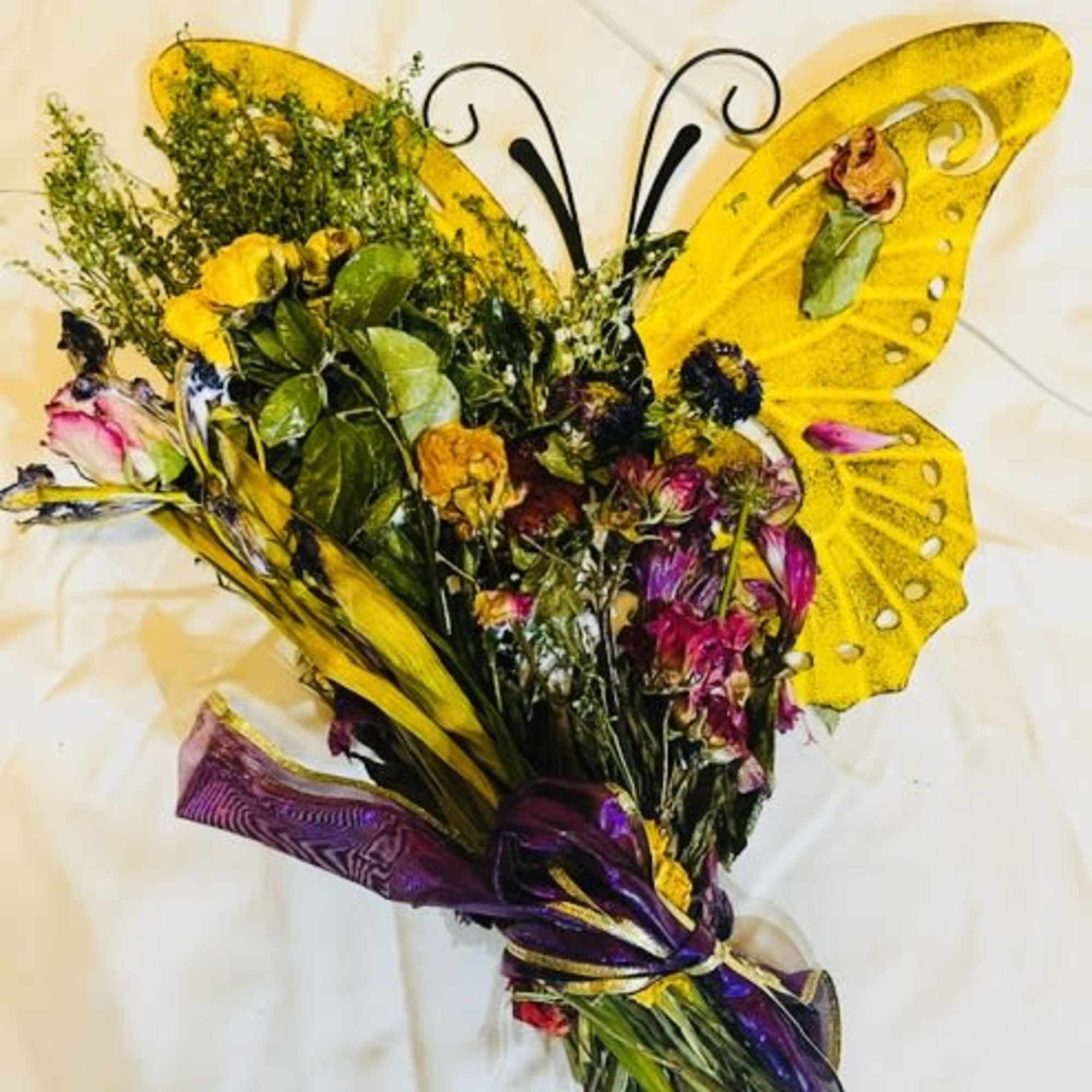 A playful butterfly-shaped flower arrangement that instantly feels like a celebration -