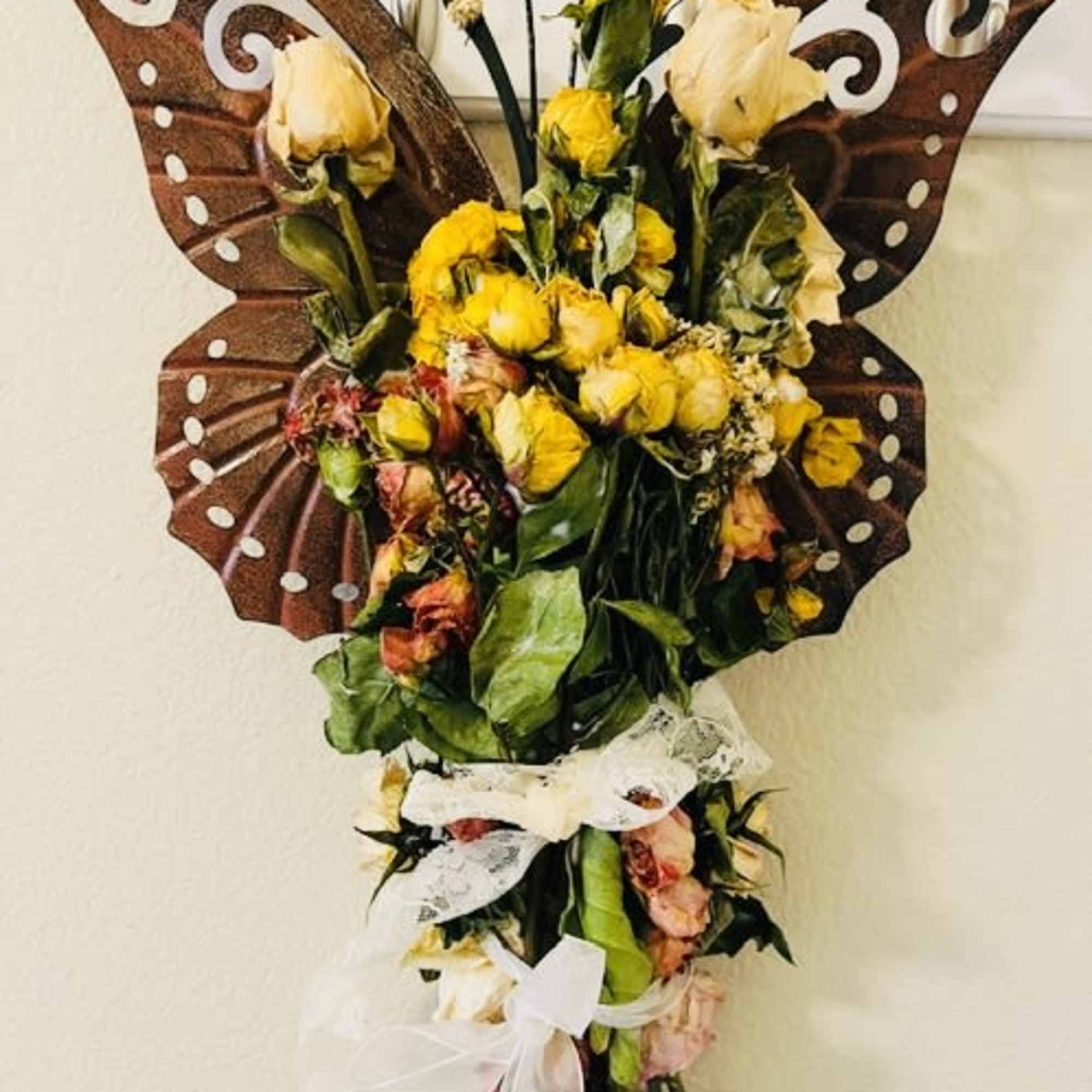 A playful butterfly-shaped flower arrangement that instantly feels like a celebration -