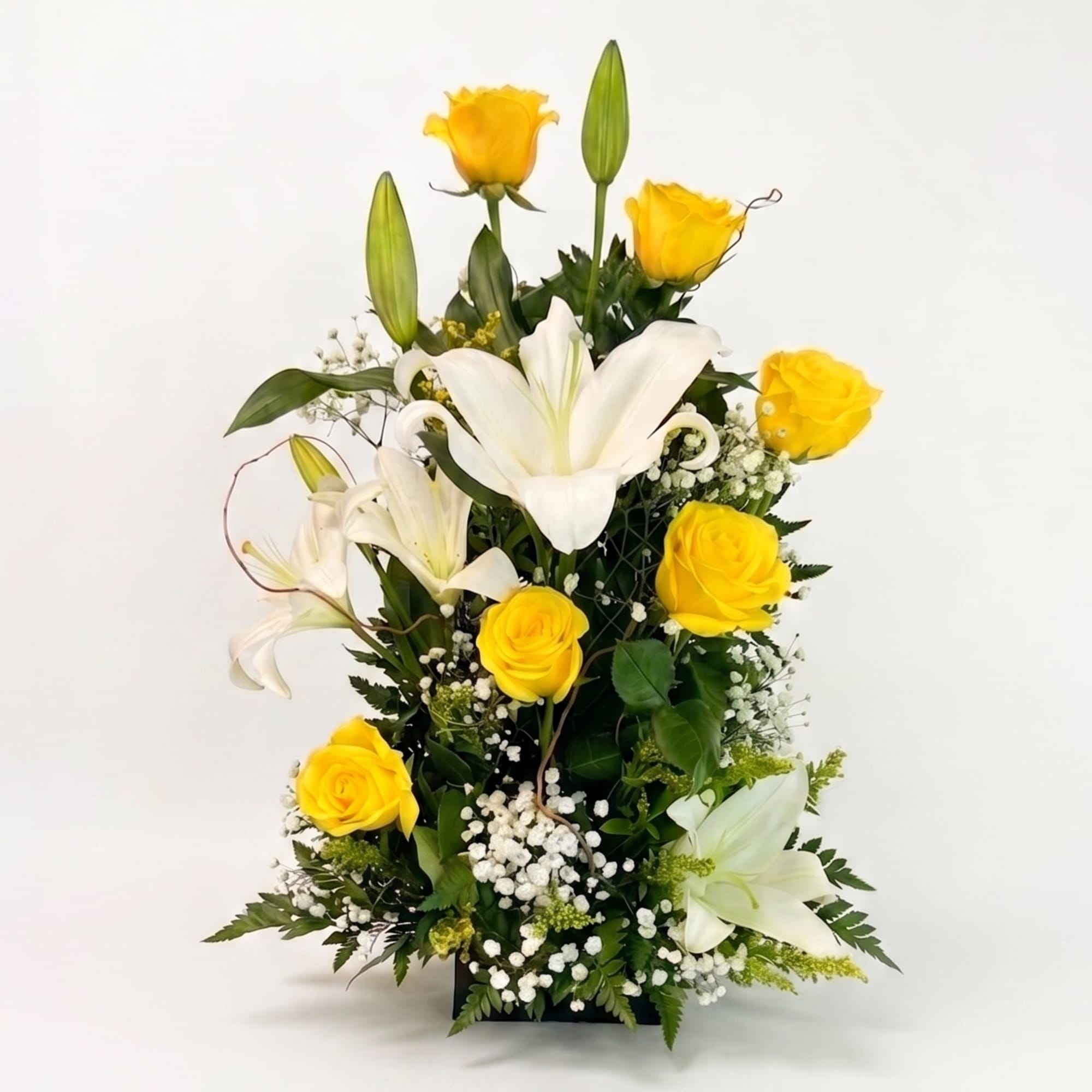 6 Yellow Roses delicately accented with white Lilies and Babies Breath make