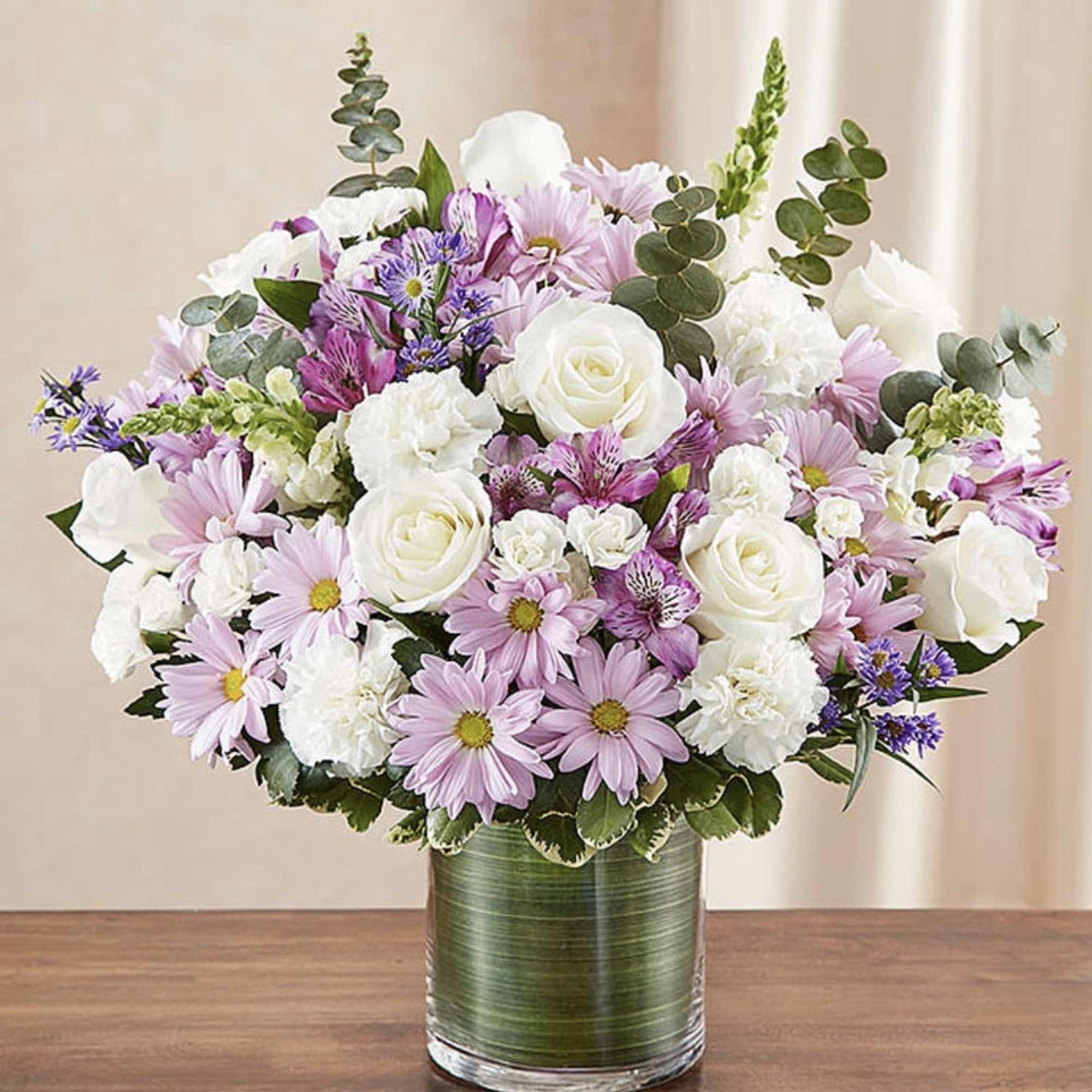 Pink and white mixed bouquet in a glass vase