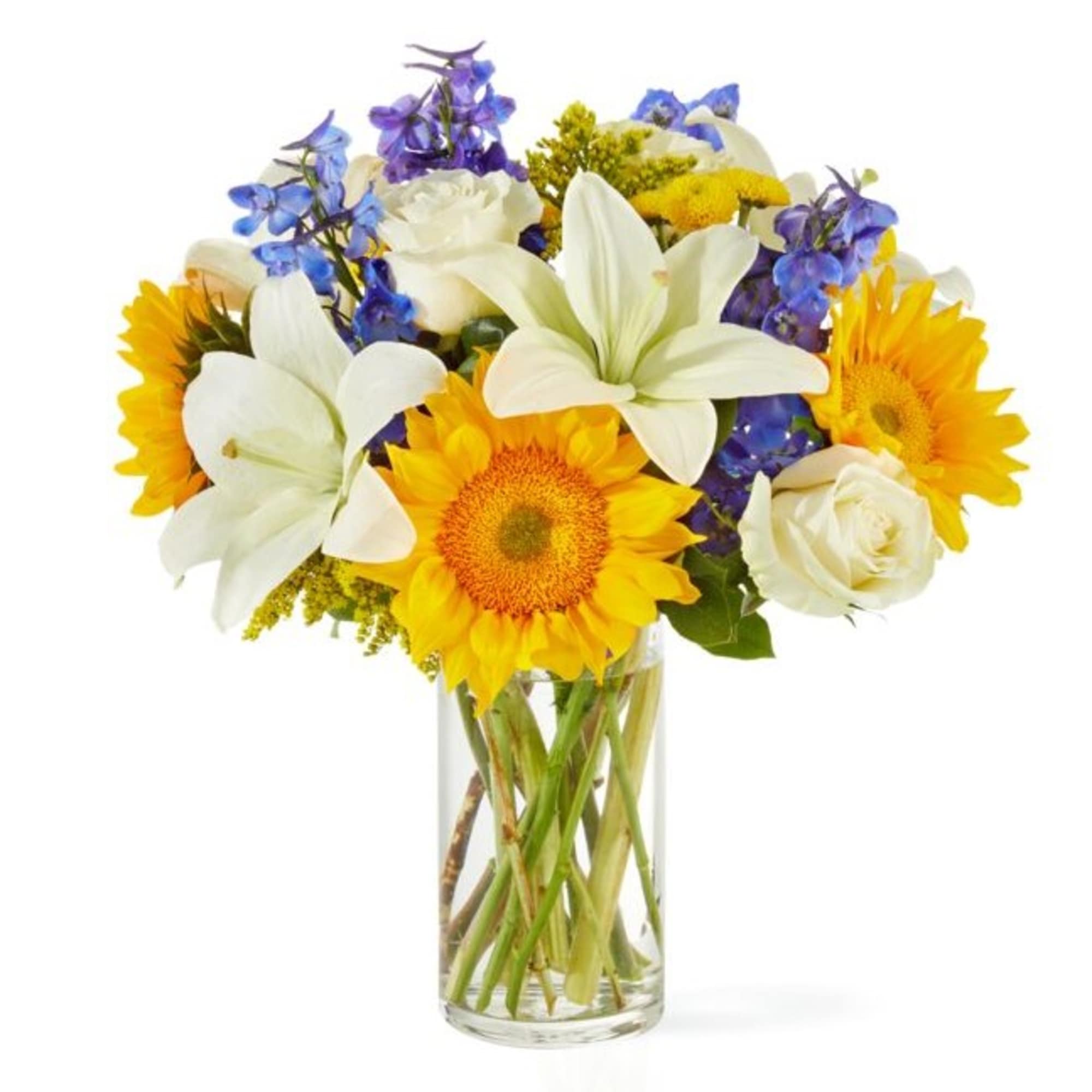 Bouquet of sunflowers, white lilies, and blue flowers in a glass vase