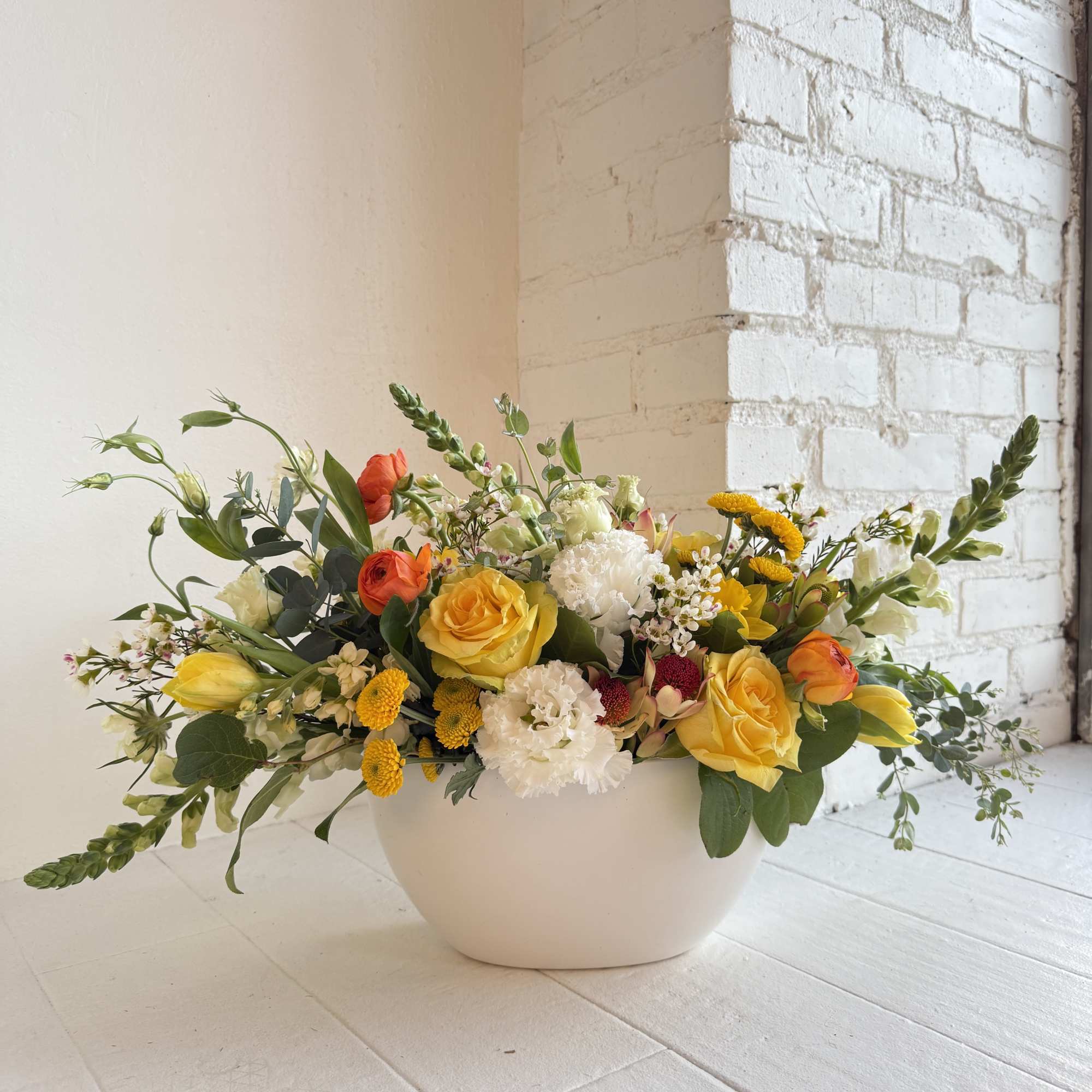 Clementine is stunning. We start with a white ceramic long low container