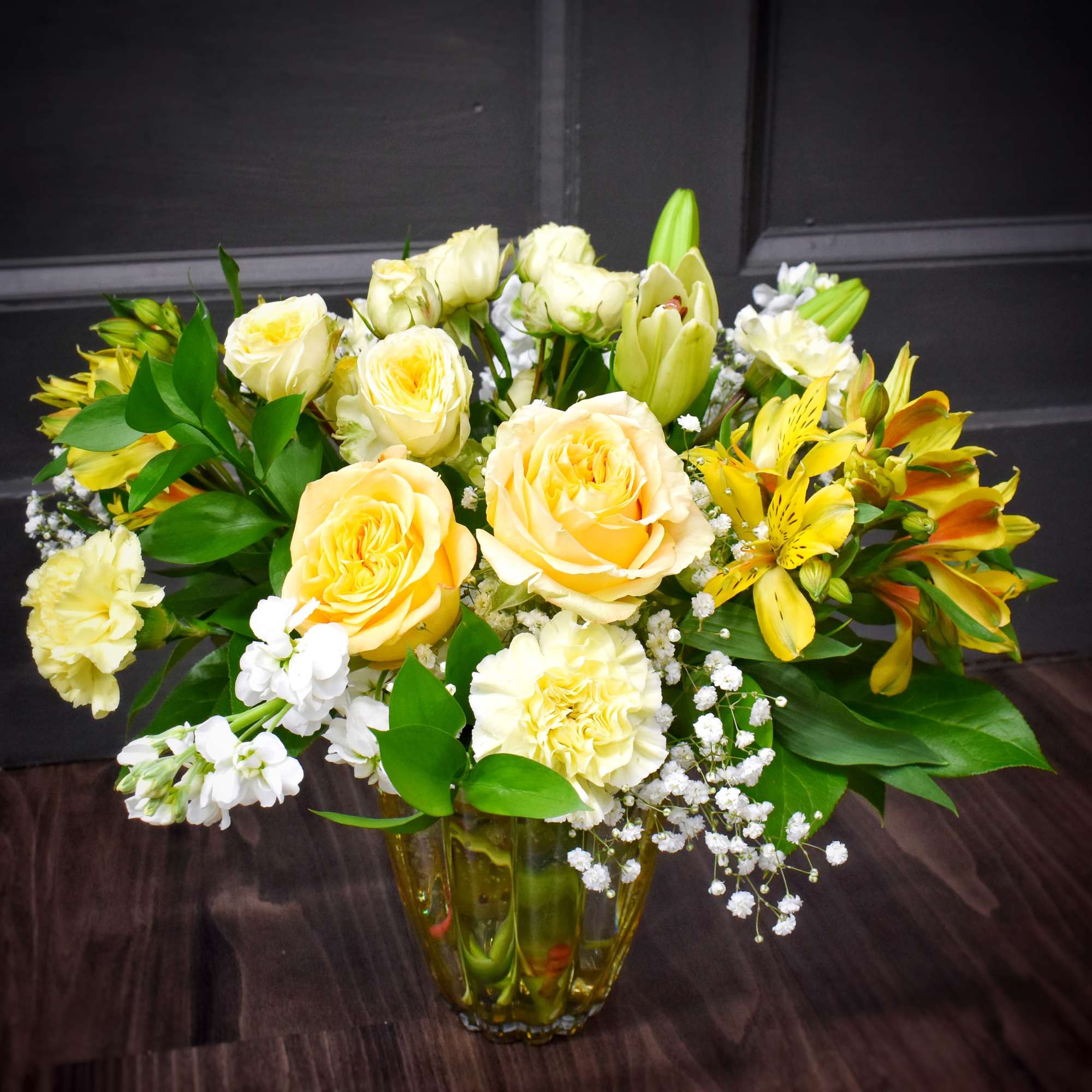 Sunlit yellow roses &amp; yellow alstroemeria combine with creamy white lilies and