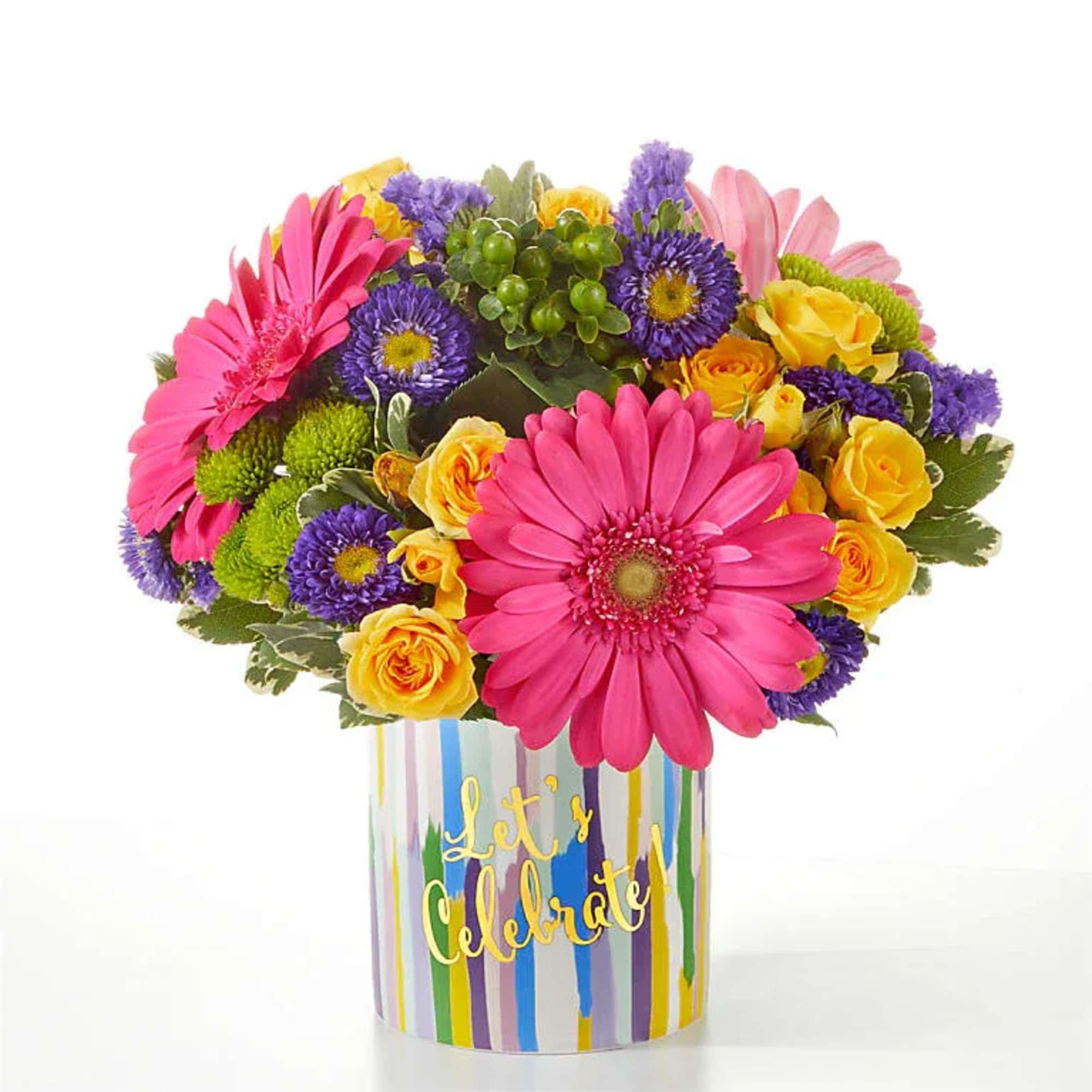A hot-pink gerbera takes center stage in this Cheers to You bouquet