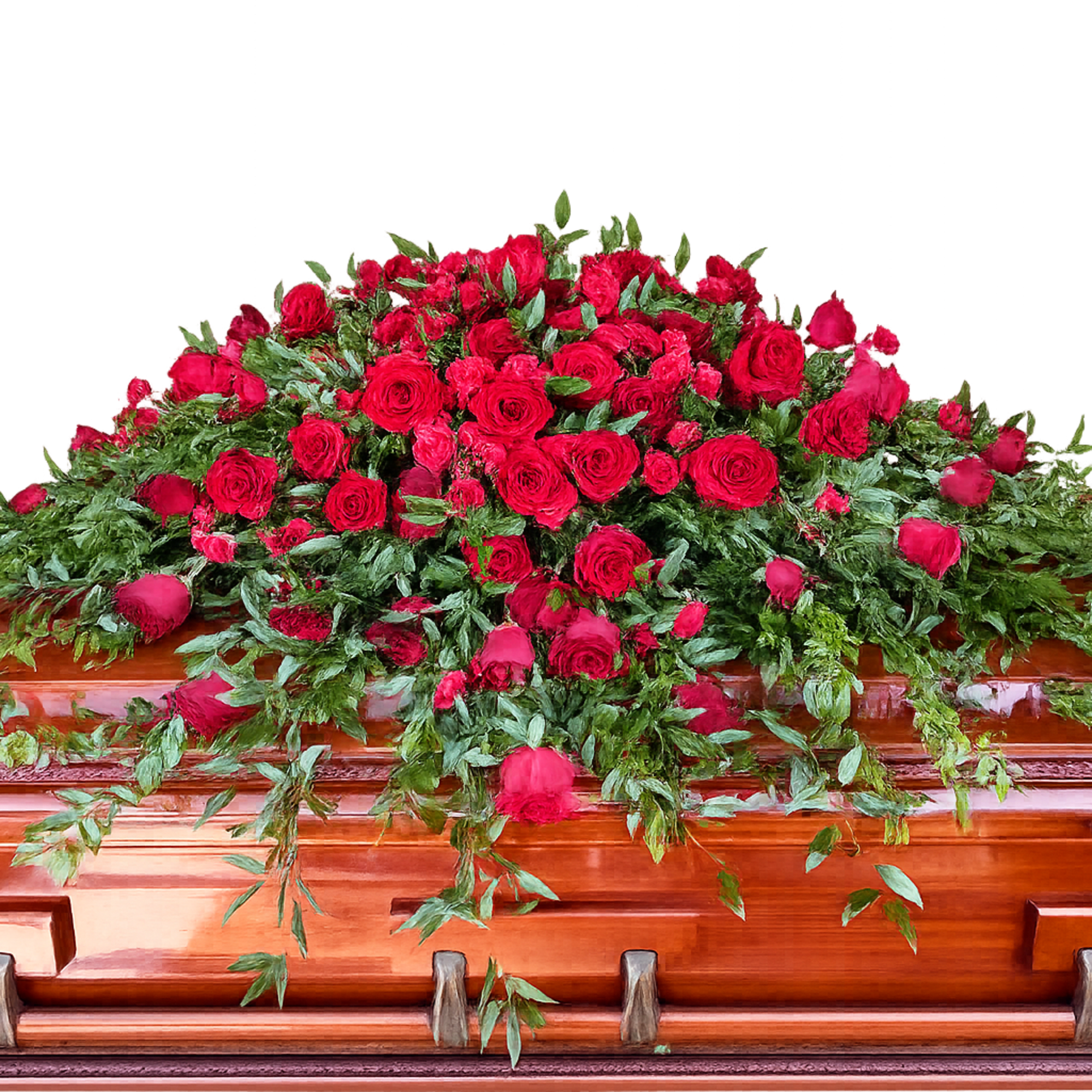 A generous cascade of tightly clustered red roses laid across a silver
