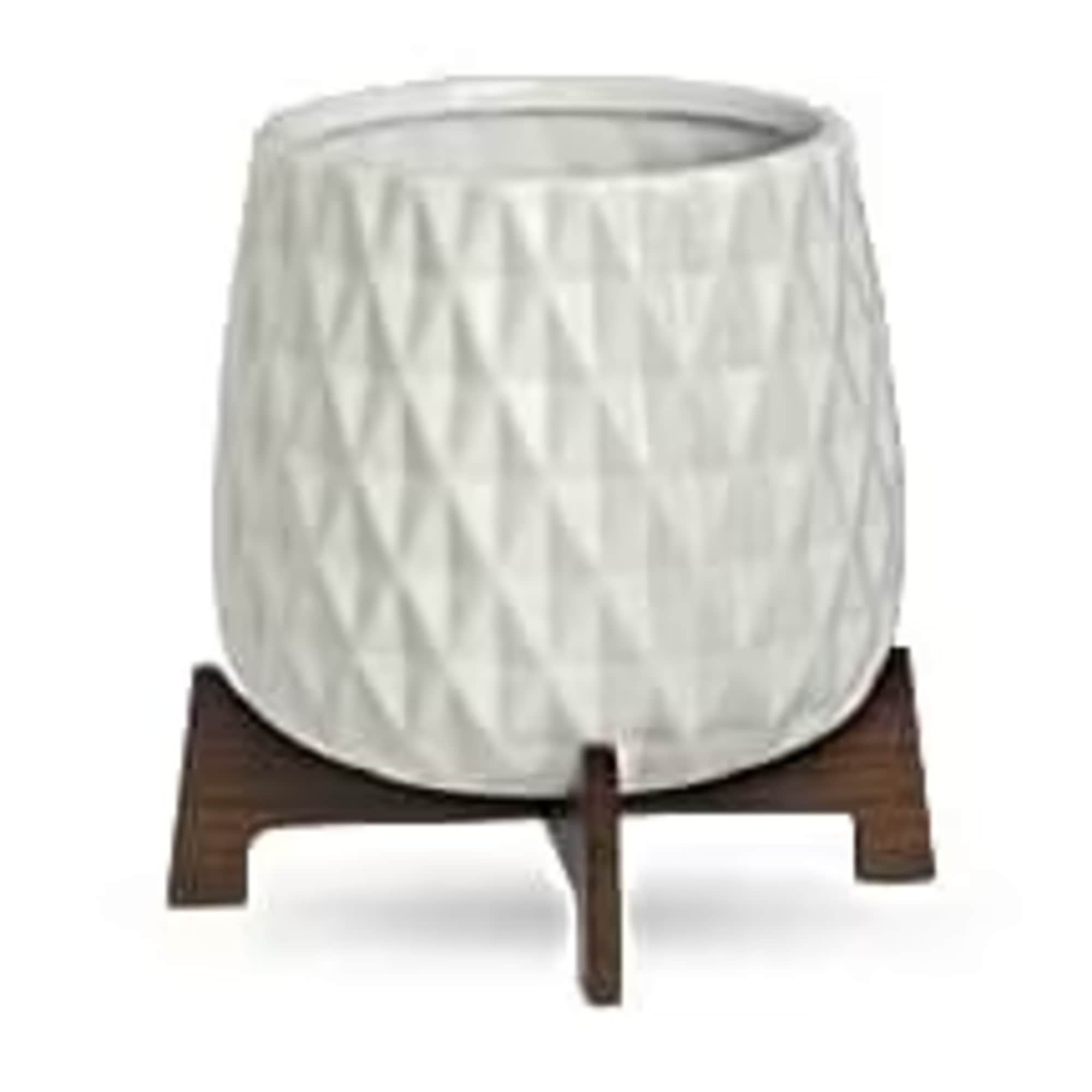 White textured planter on a wooden stand