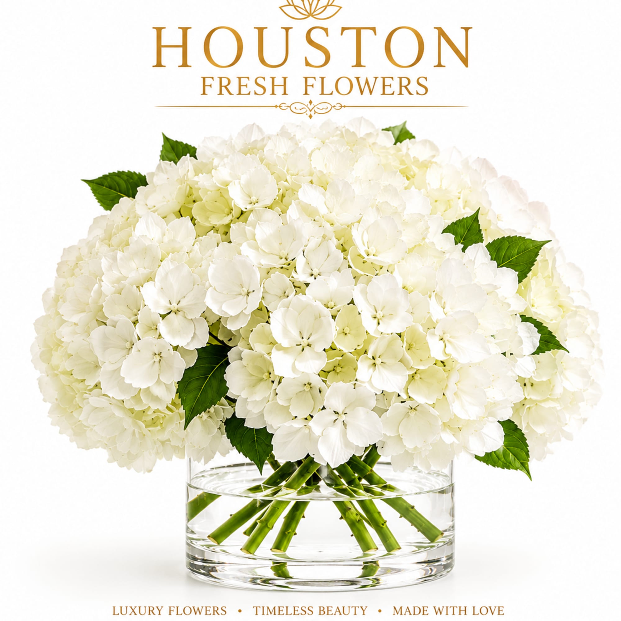 A handcrafted bouquet of lovely white hydrangeas with fresh-cut green accents in