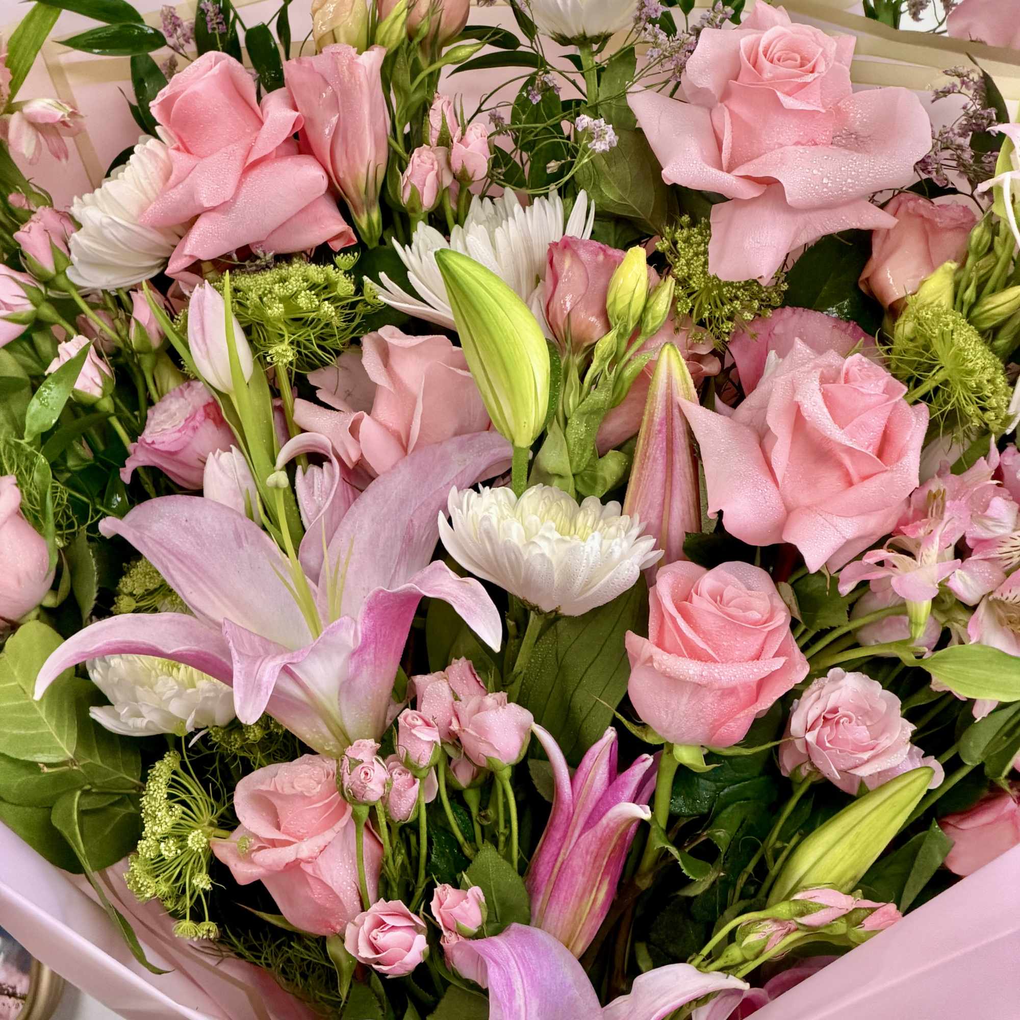A lavish, hand-tied bouquet that reads like a love letter in soft
