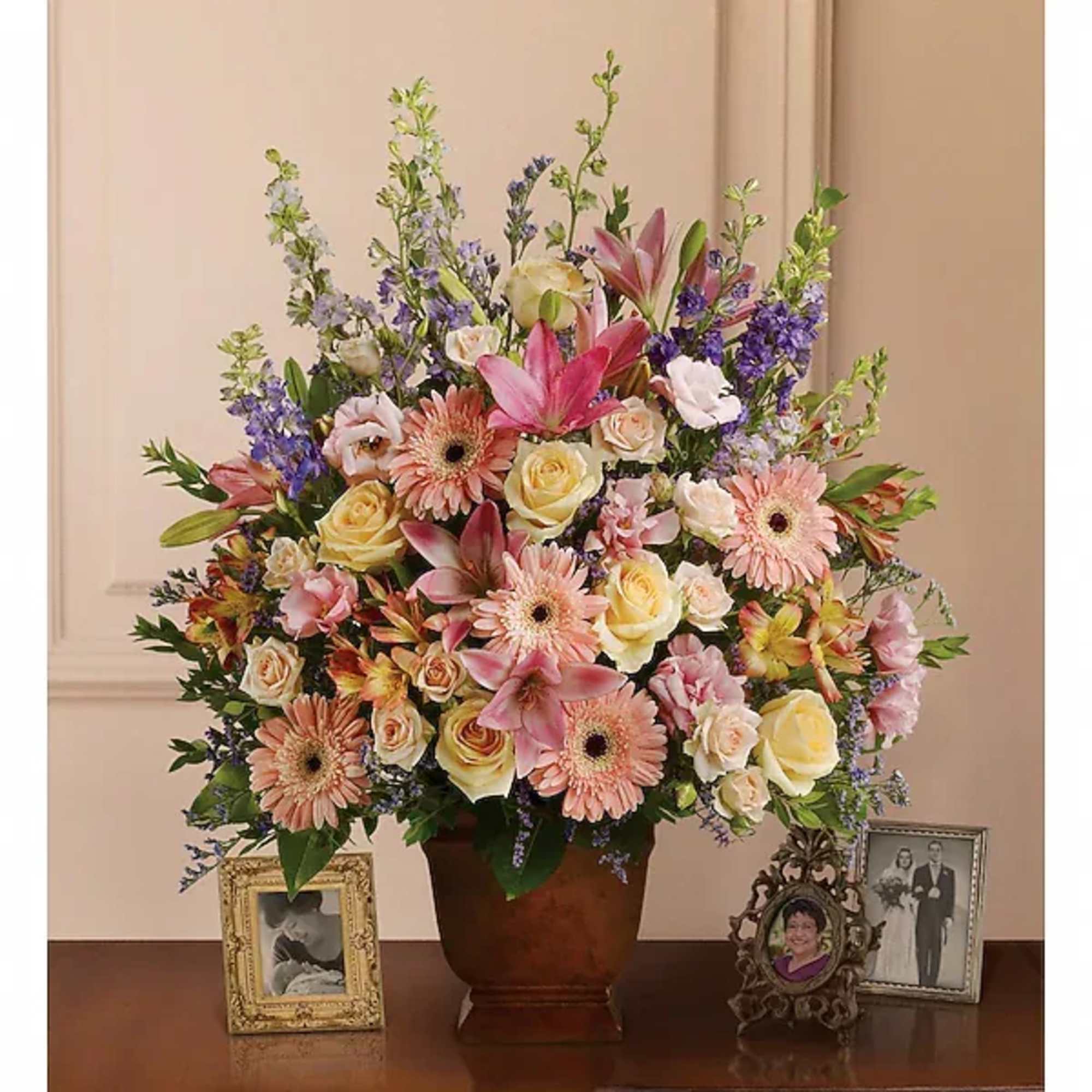 A warm and peaceful bounty of pastel blossoms gently expresses love and