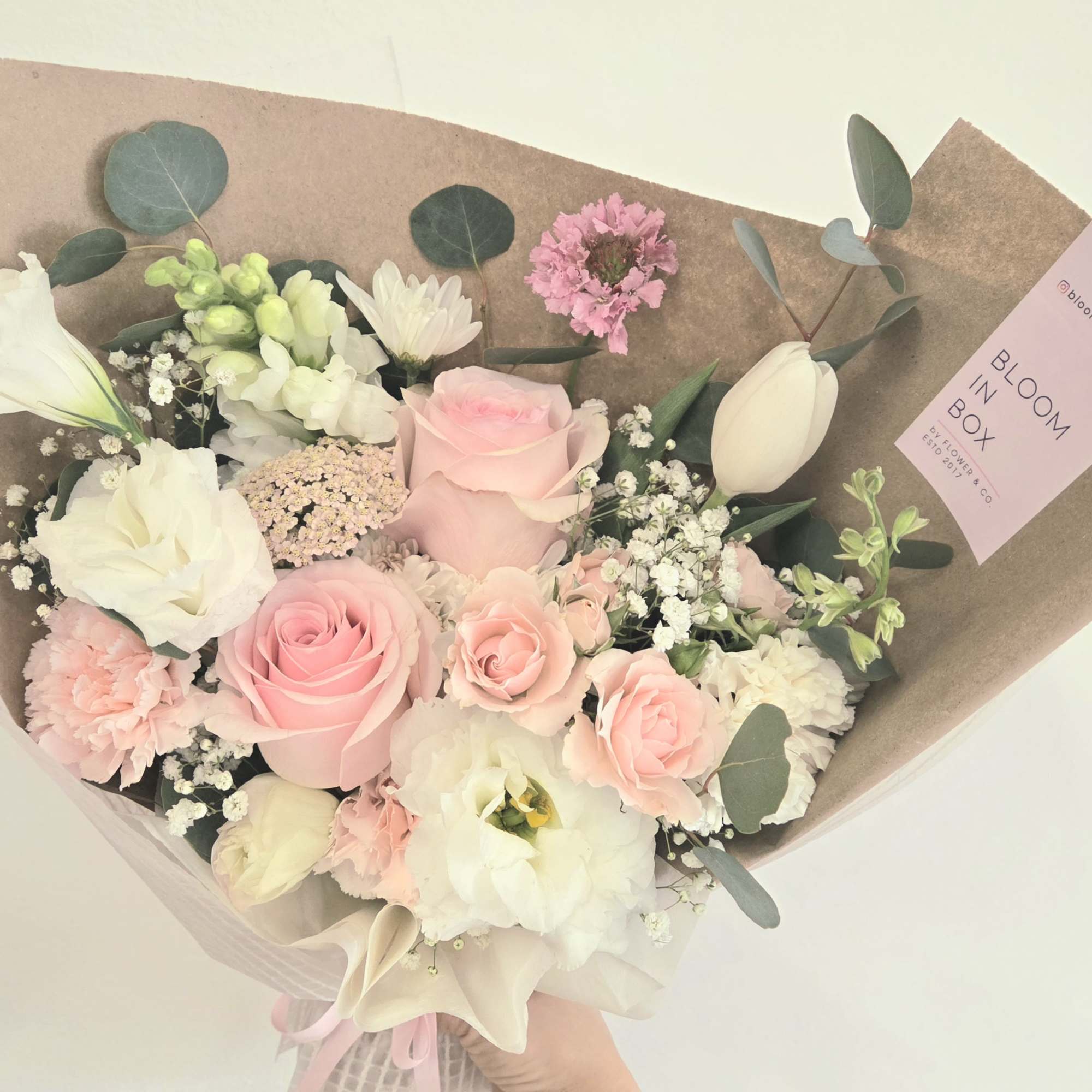 Hand-held Bouquet
The bouquet shown in the photo is our Standard Size, wrapped