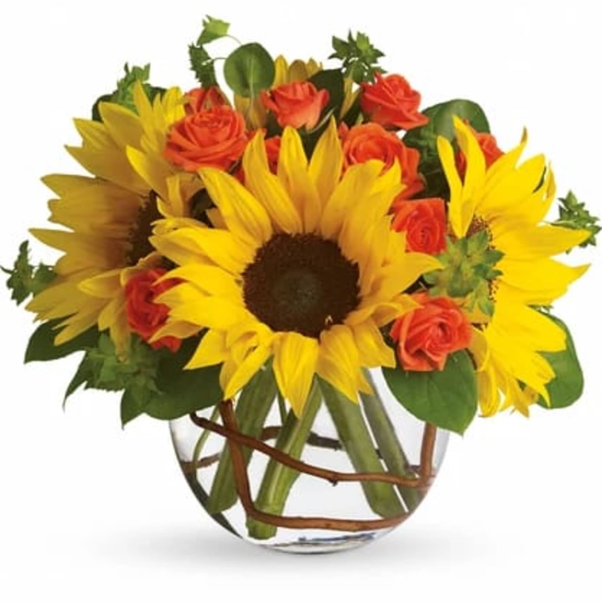 Sunflowers and orange roses in a clear glass vase