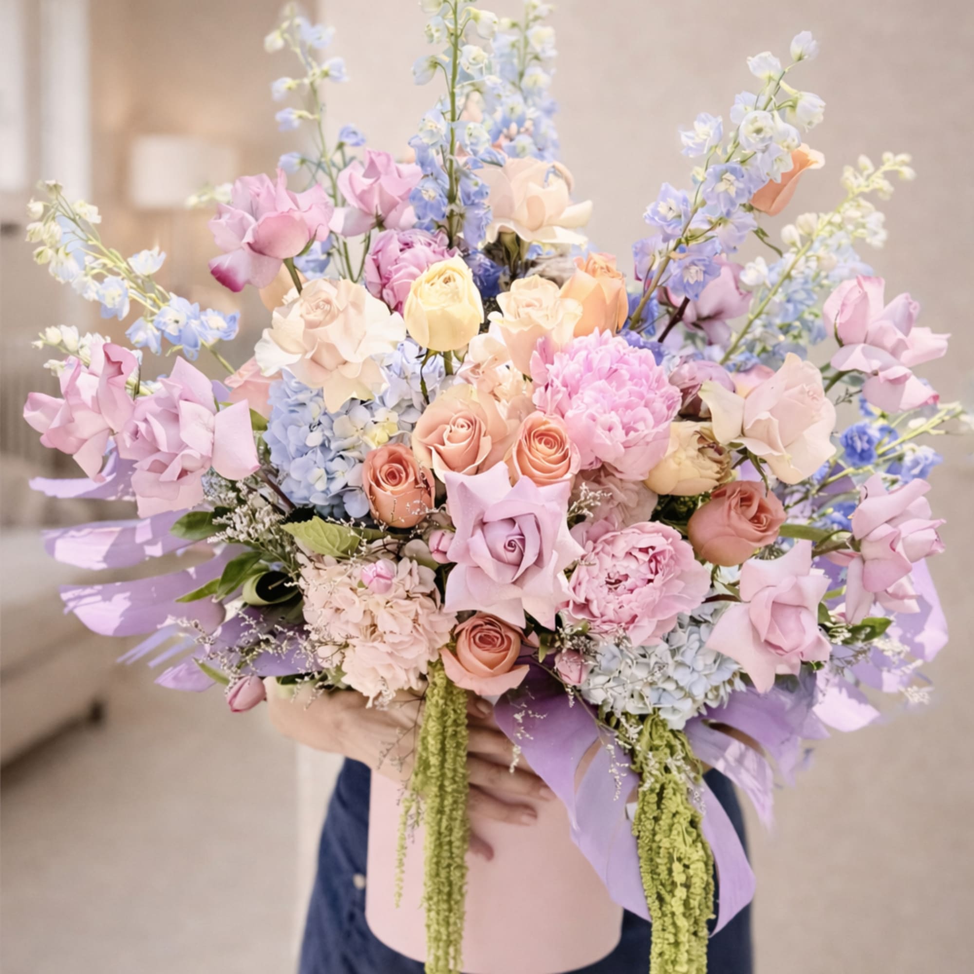 Pastel-packed and dreamy, this large floral arrangement brings a soft, romantic garden