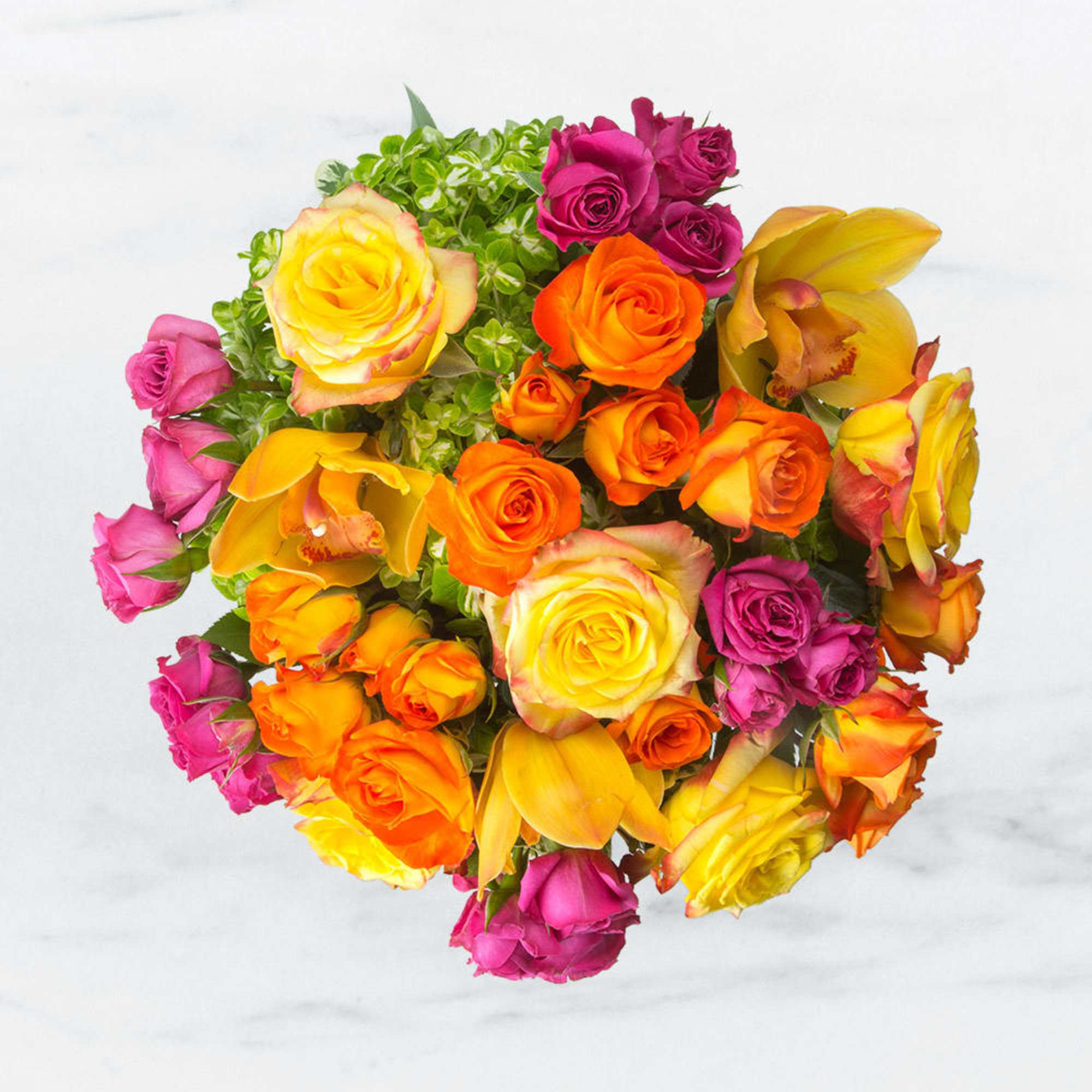 Bouquet of multicolored roses with yellow orchids