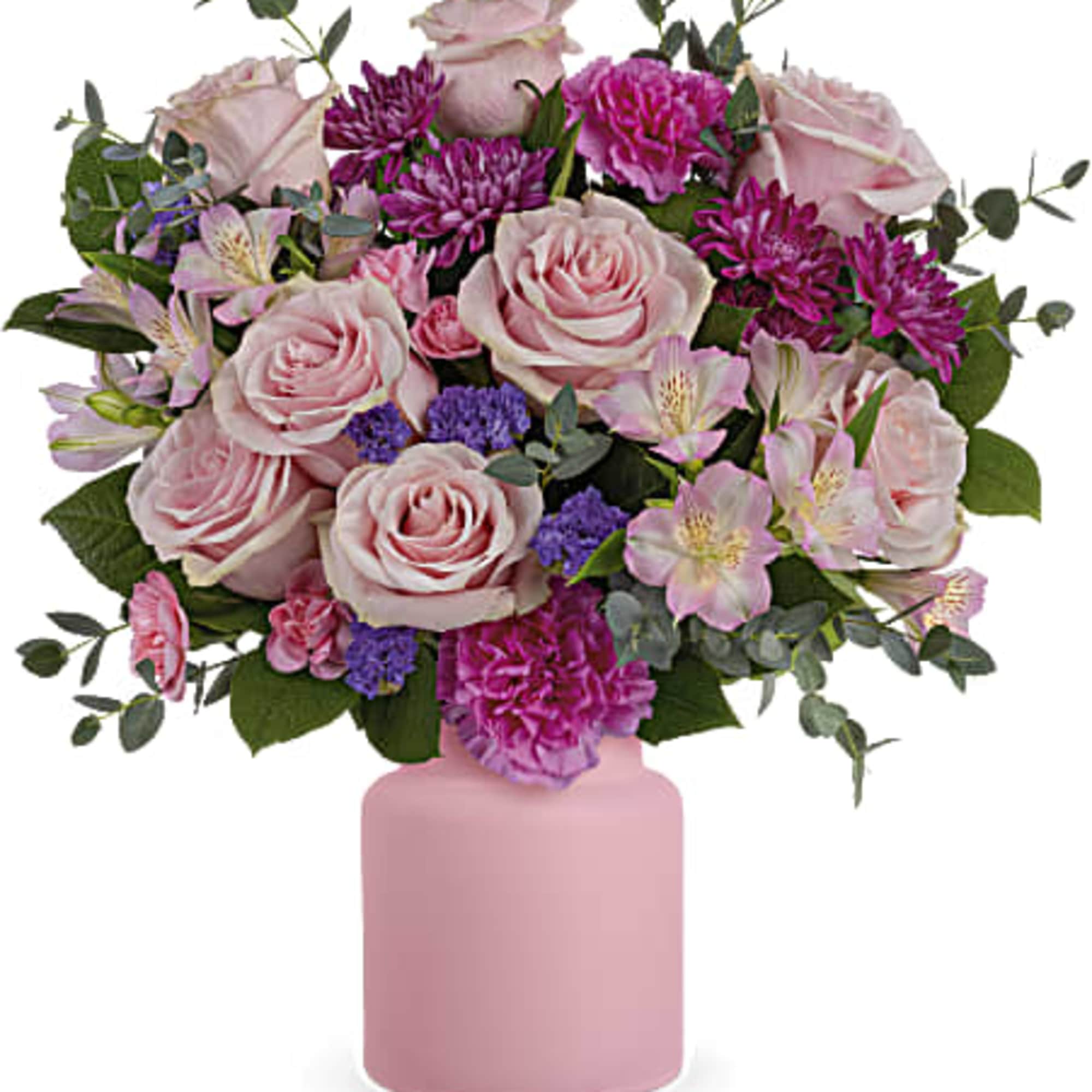 Pink and purple flower arrangement in a pink vase