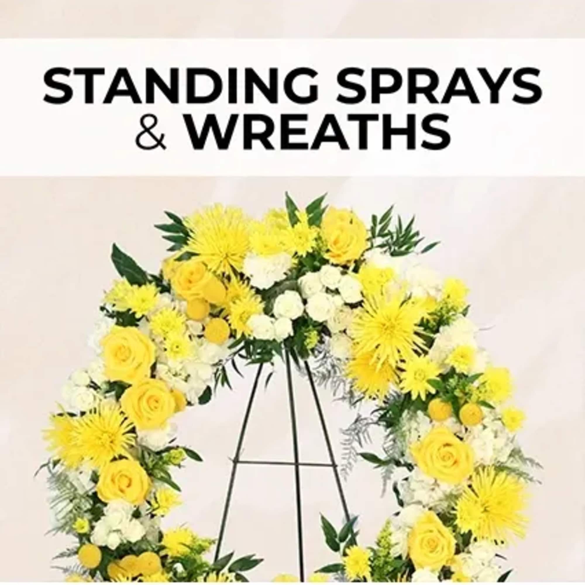 Make a graceful gesture with a custom standing spray or wreath. Designed
