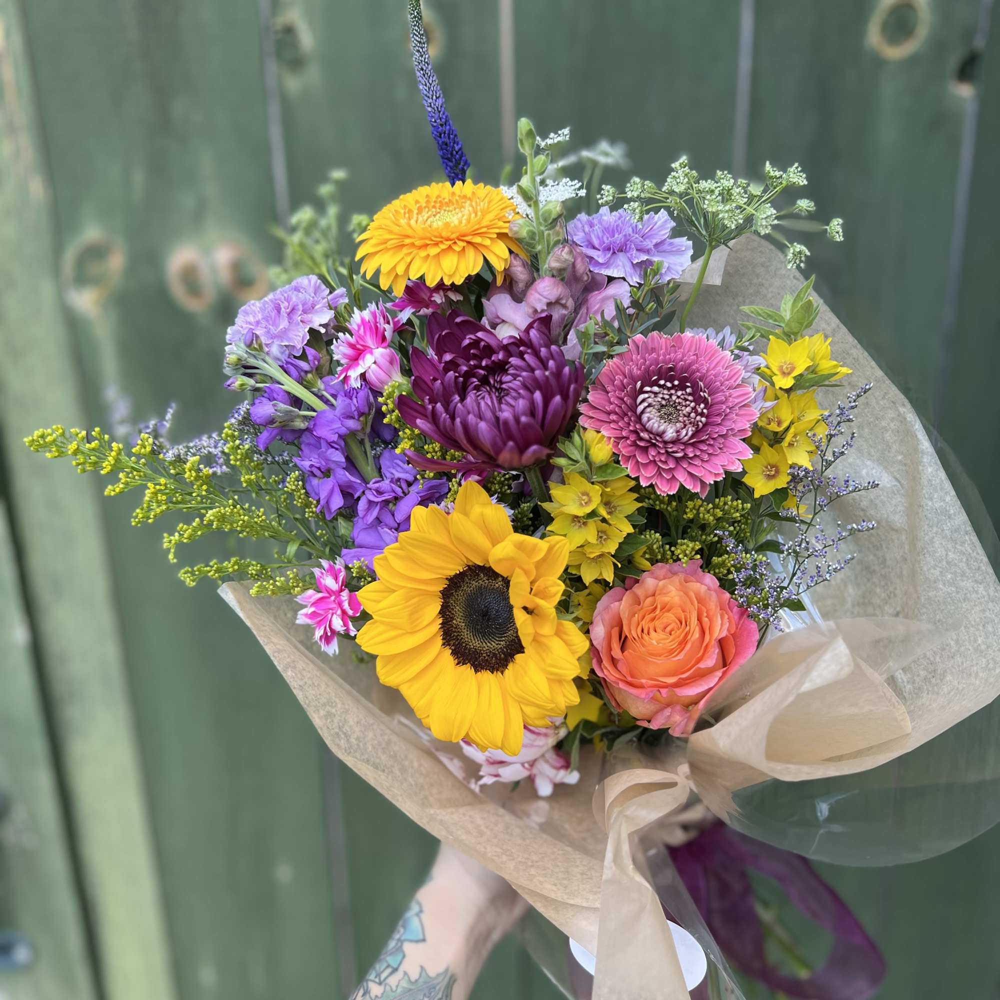 Our Wrapped Designer&rsquo;s Choice Bouquet is handcrafted by our floral designers using
