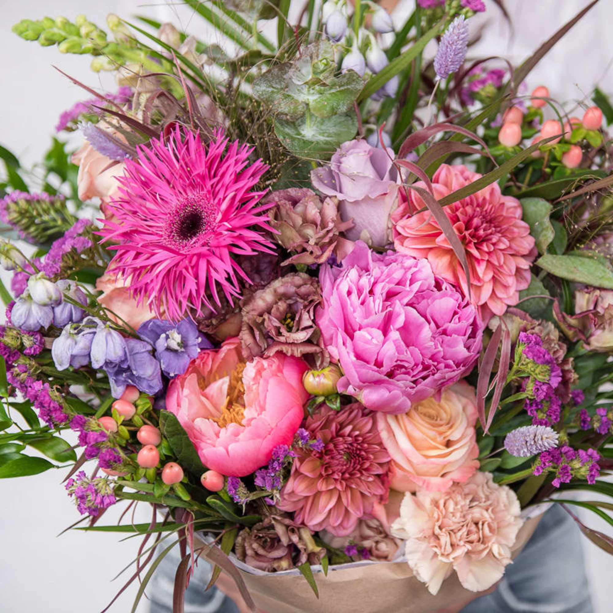 A lush, hand-tied summer bouquet that bursts with joyful color-perfect as an