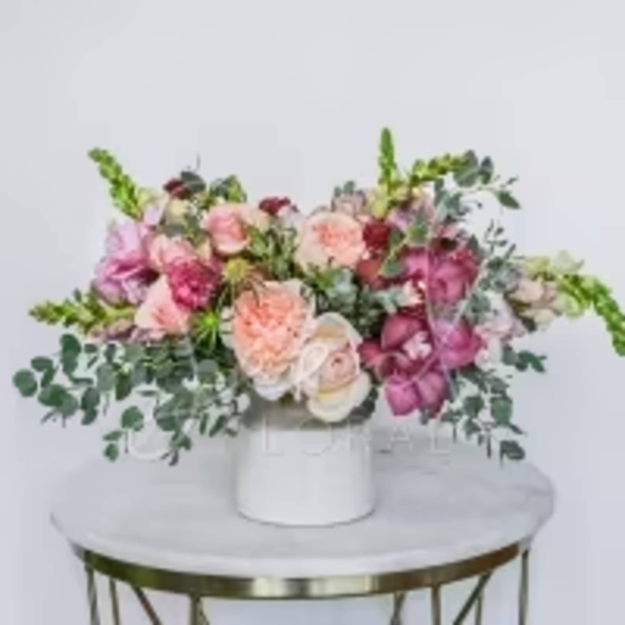 The Sweetest Thing is a romantic, feel-good floral arrangement designed to make