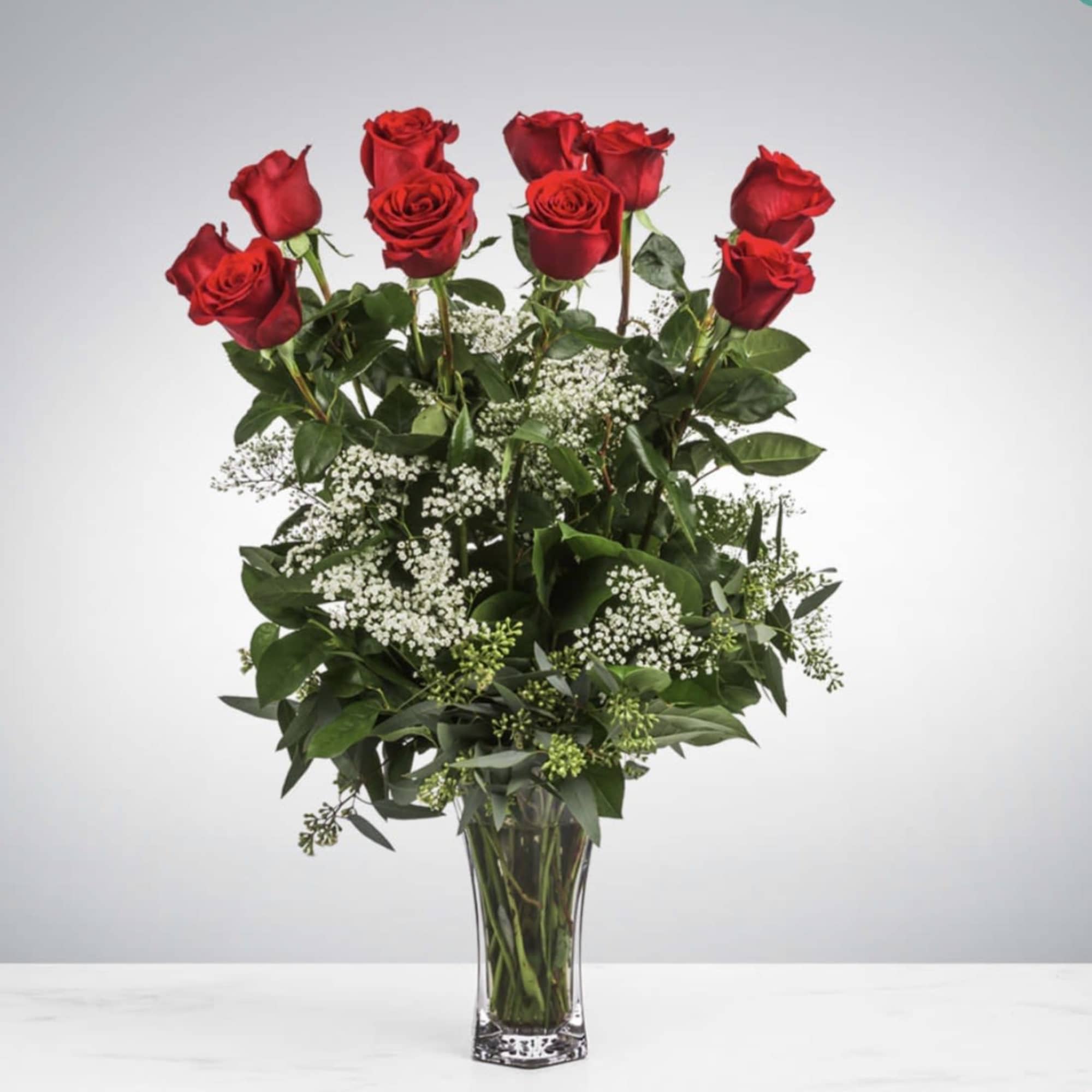 These dozen red roses with baby's breath are classic! Perfect romantic gift