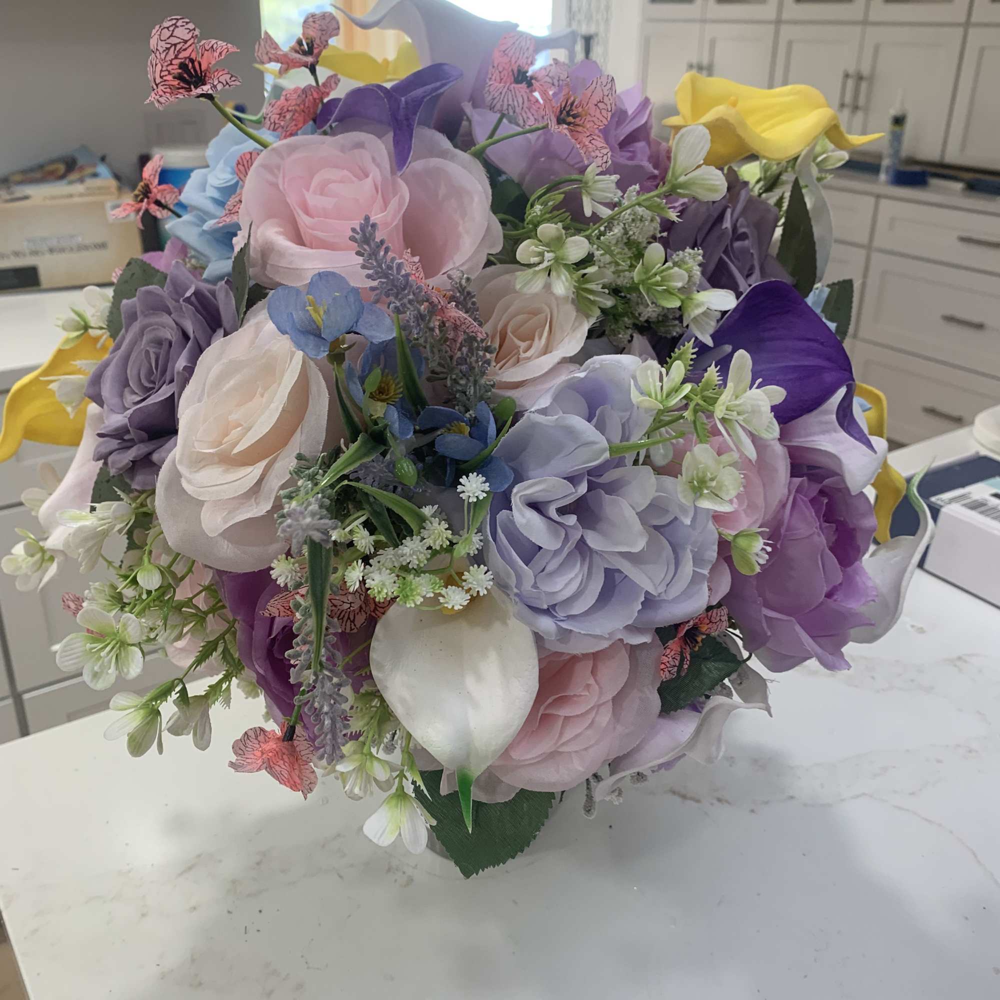 A romantic, full-rounded bridal bouquet that reads like spring in pastels-soft blush