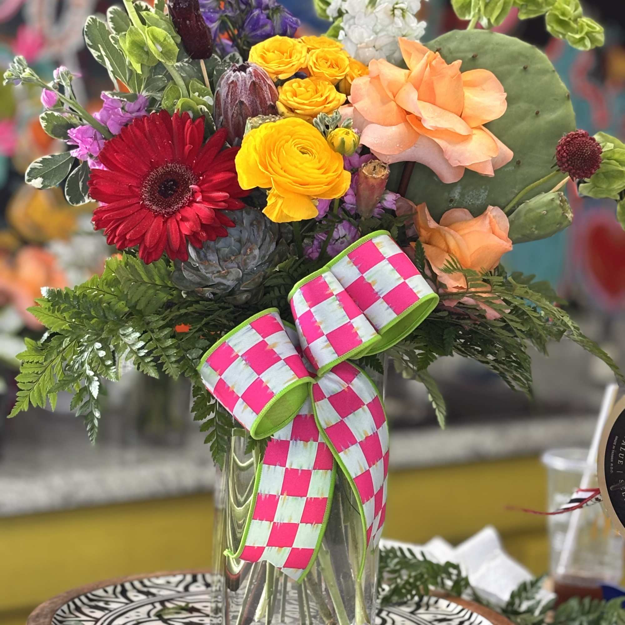 A bold, garden-style flower arrangement that feels like a backyard bloom-filled celebration