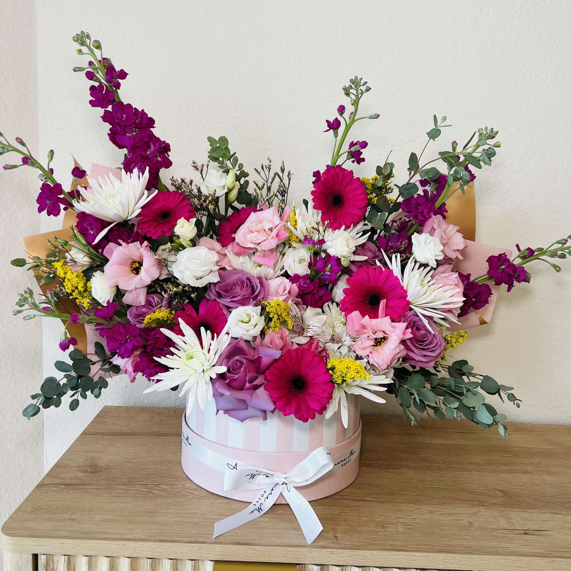 Elevate any occasion with the Luxe Flower Box, a modern floral arrangement