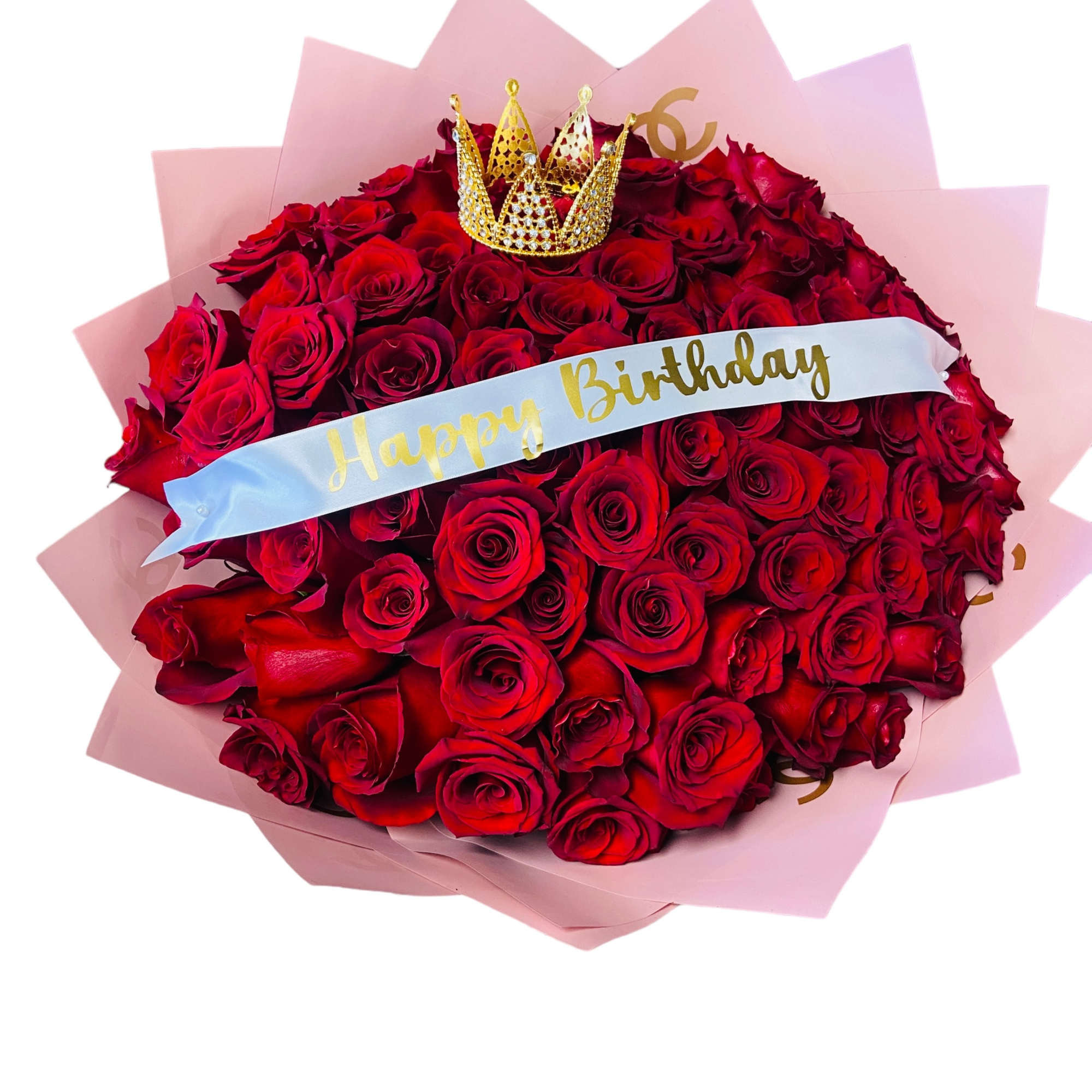 Large bouquet of red roses with a birthday ribbon and crown topper