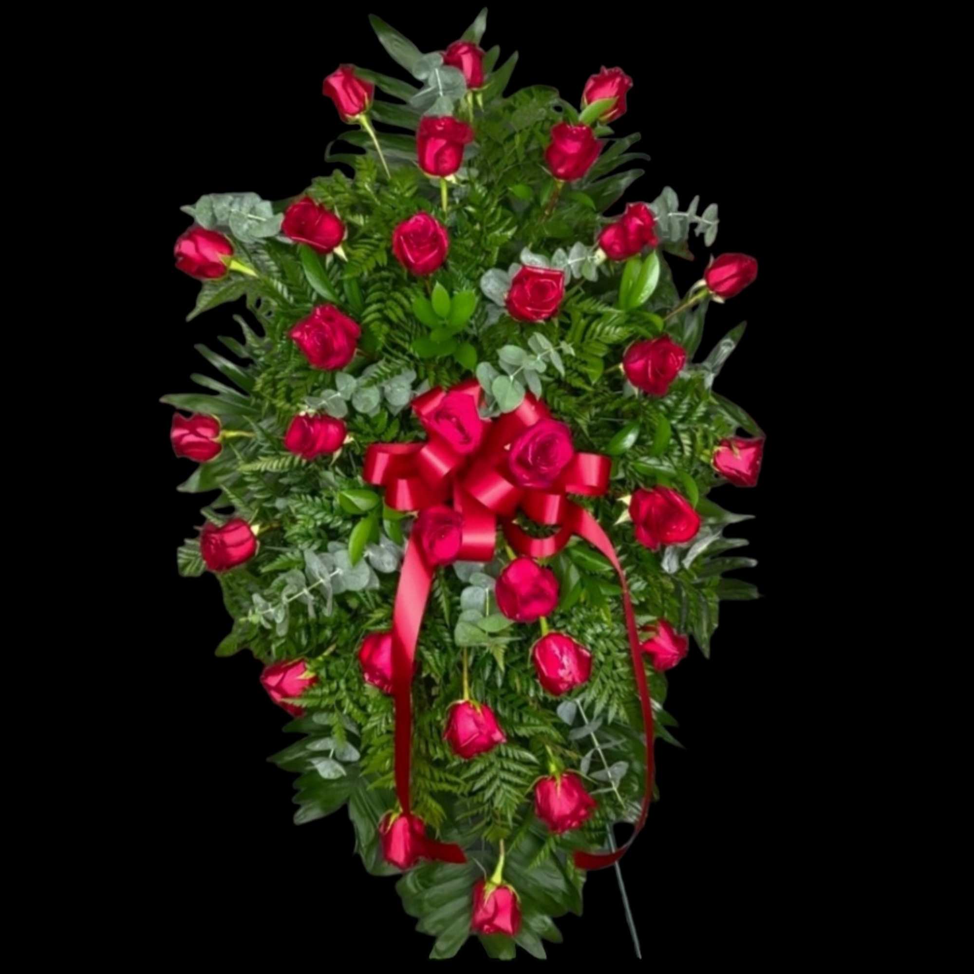 2 dozen red roses on an easel