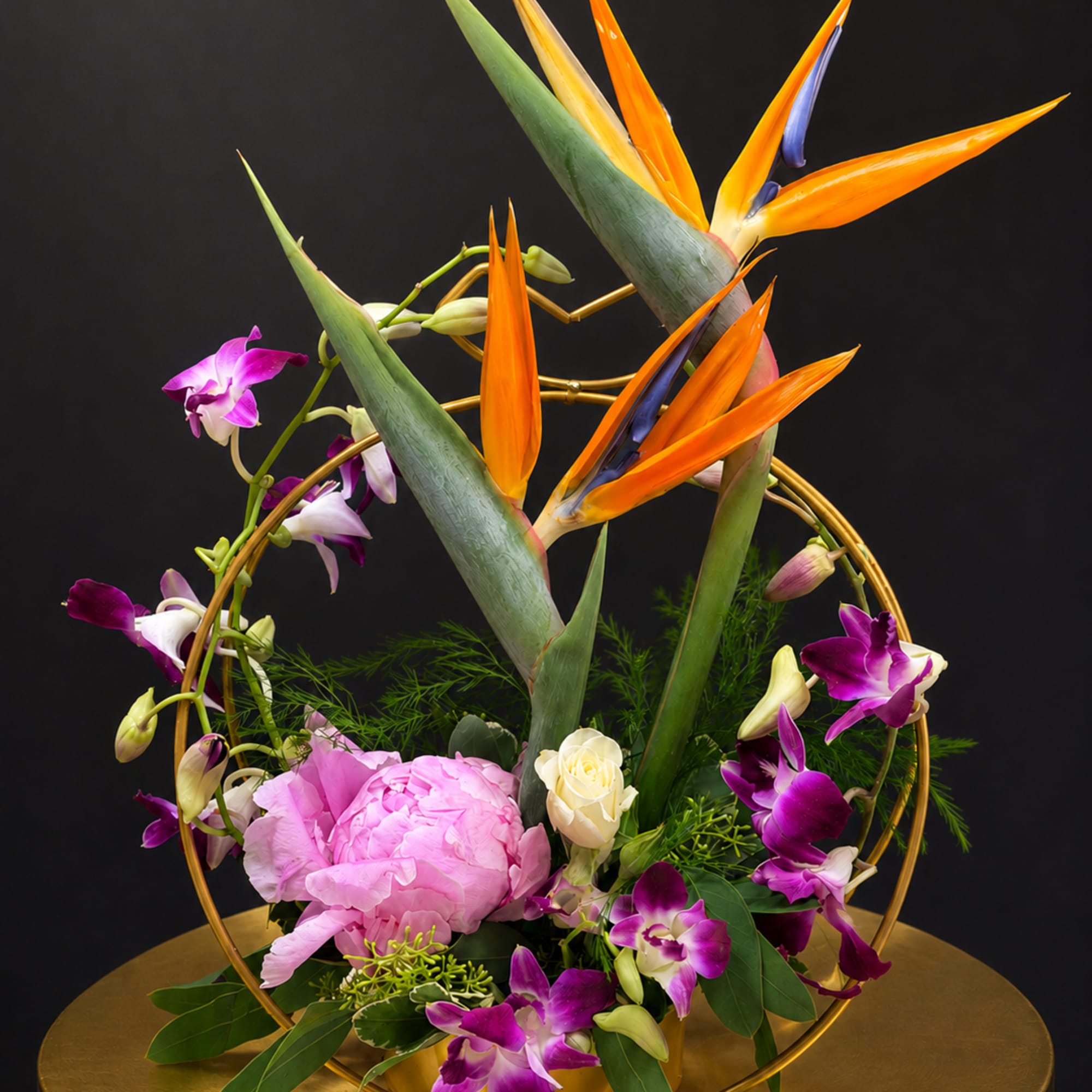 This beautiful and elegant arrangement made with bride of paradise , pink
