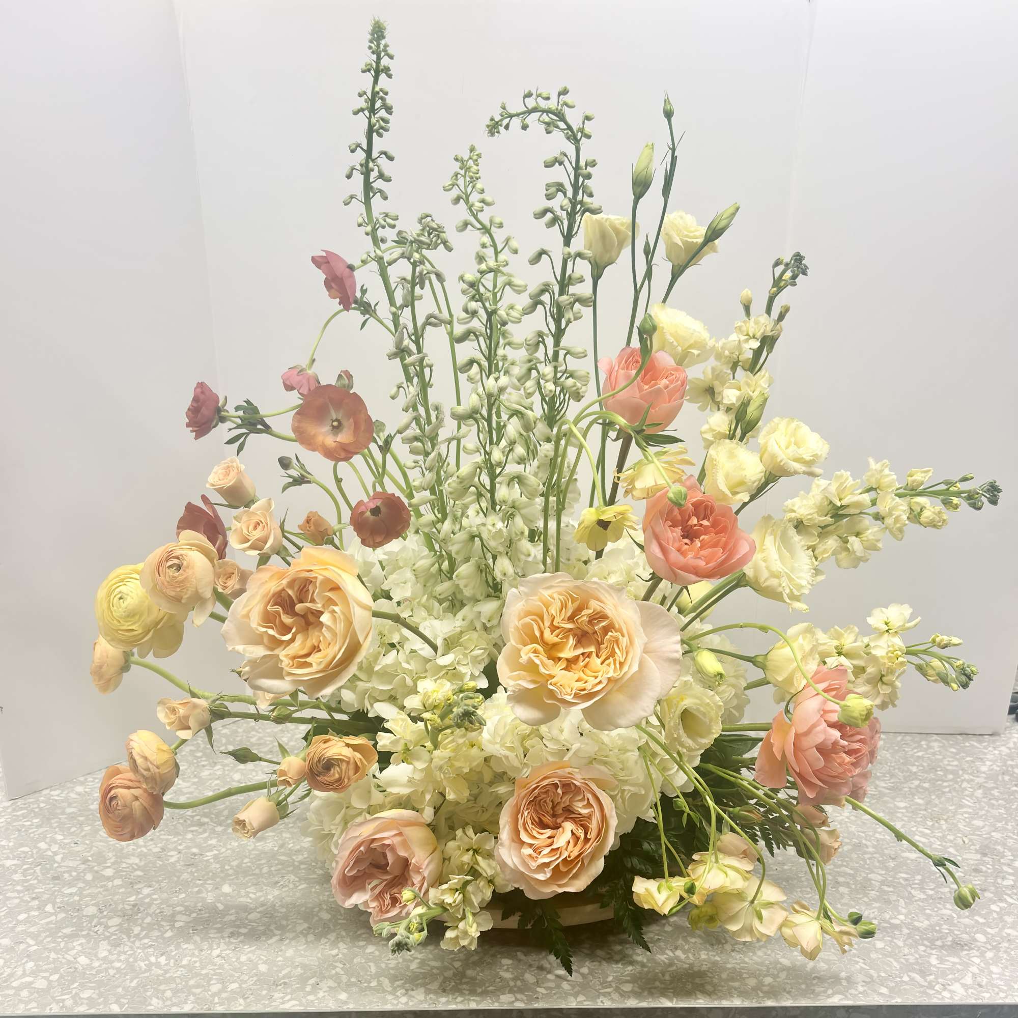 Make a sophisticated statement with our Grand Occasion Ceremony Arrangement, a high-end