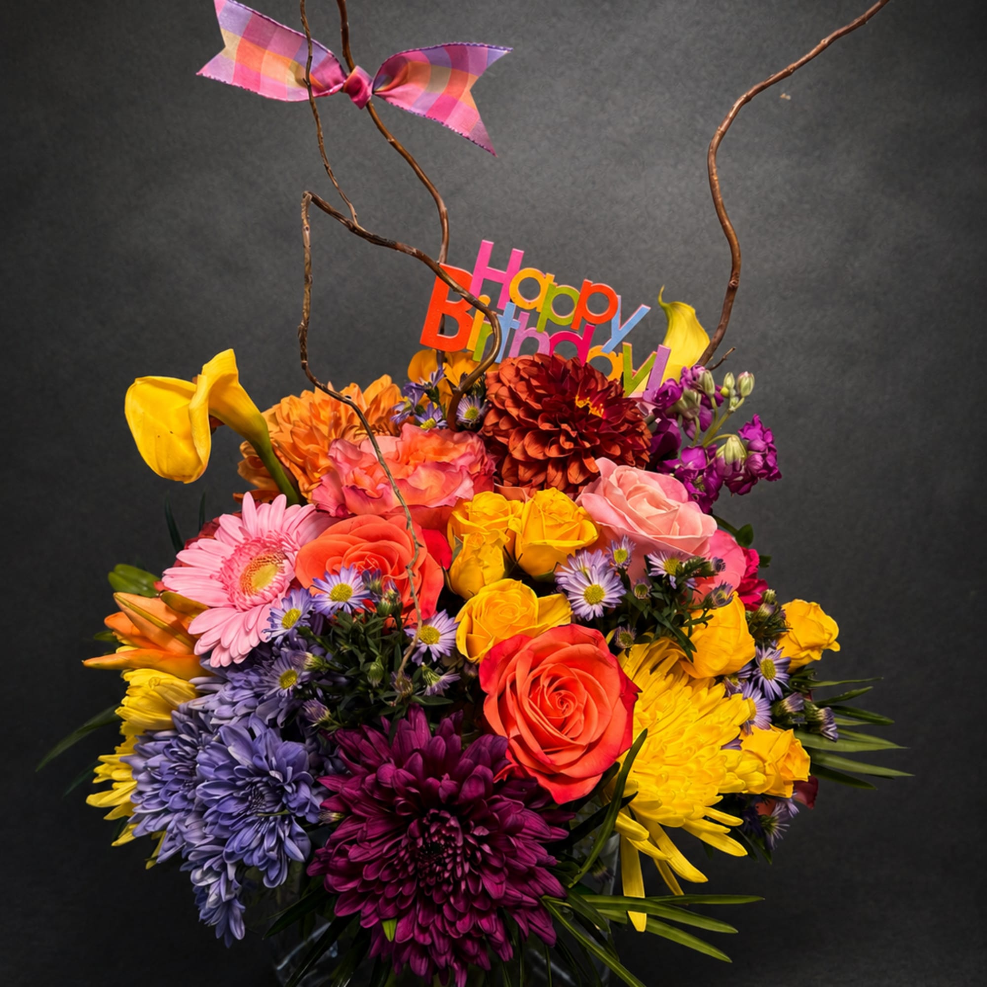 A burst of party-ready color-this birthday bouquet is designed to make the