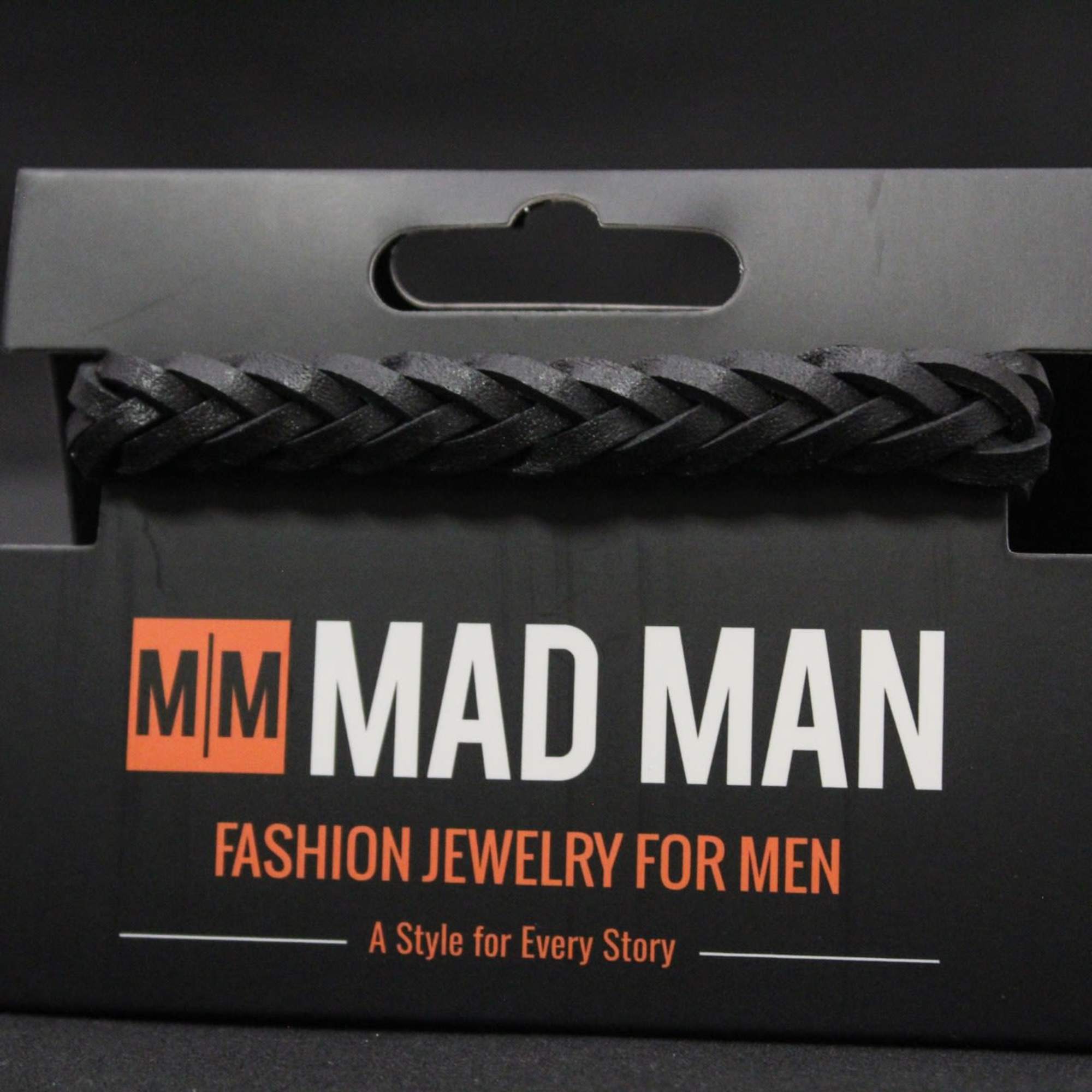 Chunky black braided leather gives this men's bracelet a bold, casual edge-perfect
