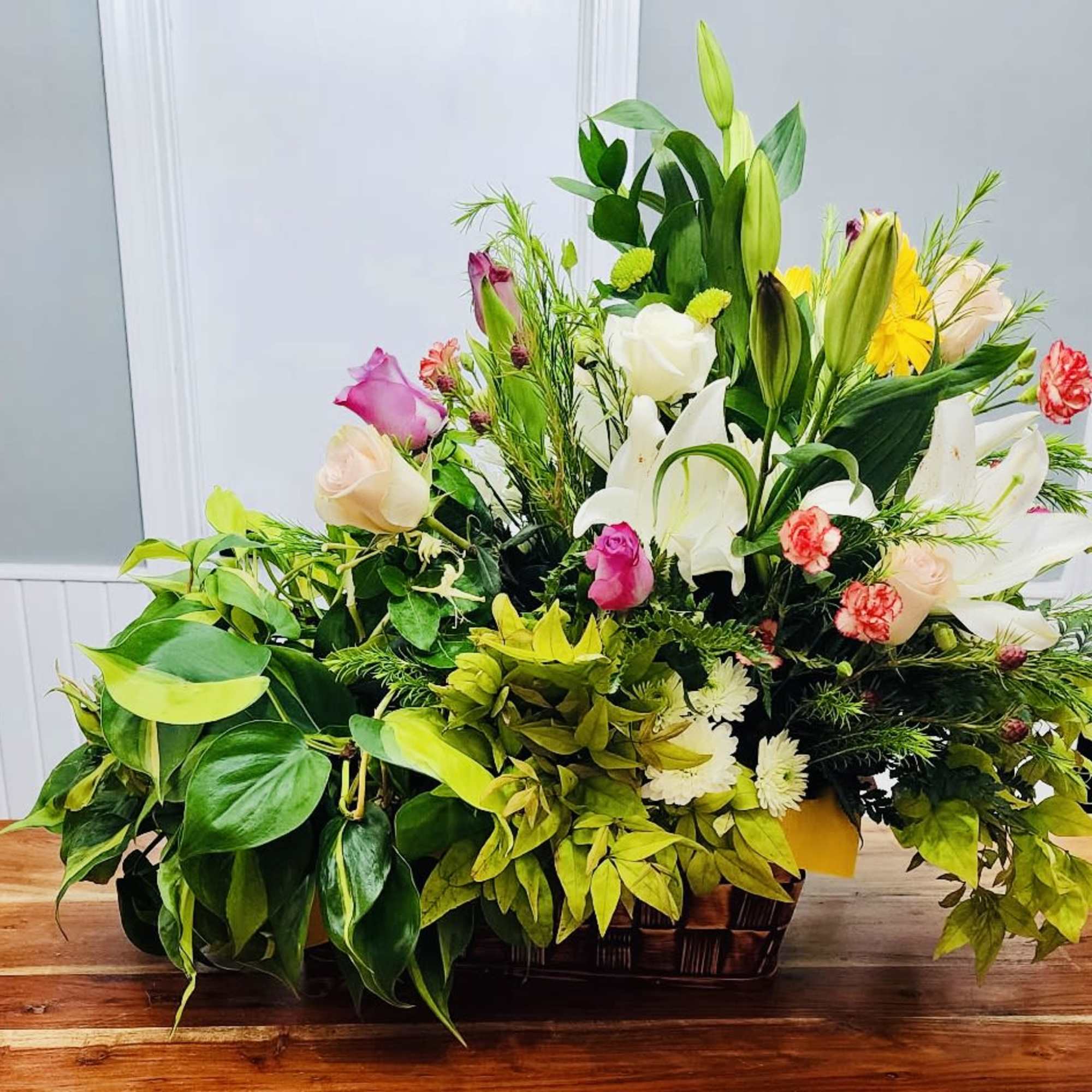 Amazing Floral arrangement with a Plant Combo in a basket