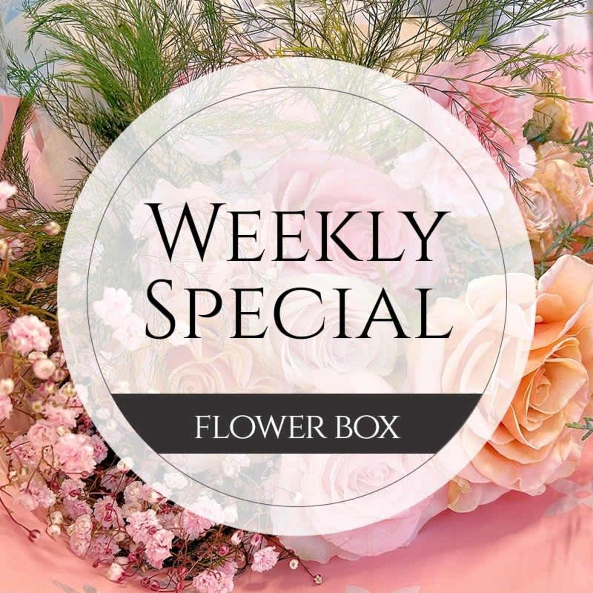 Pink and peach flower box with roses and baby's breath