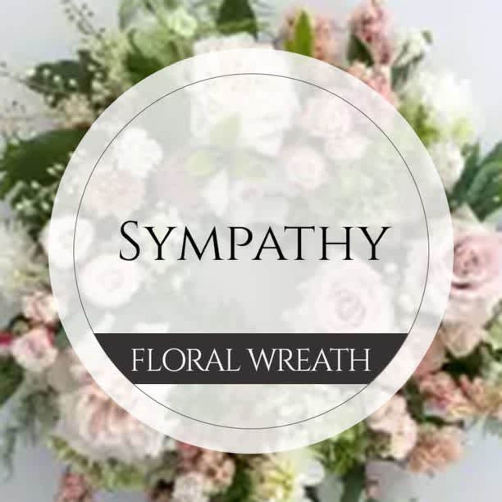 Sympathy floral wreath with pale pink and white flowers