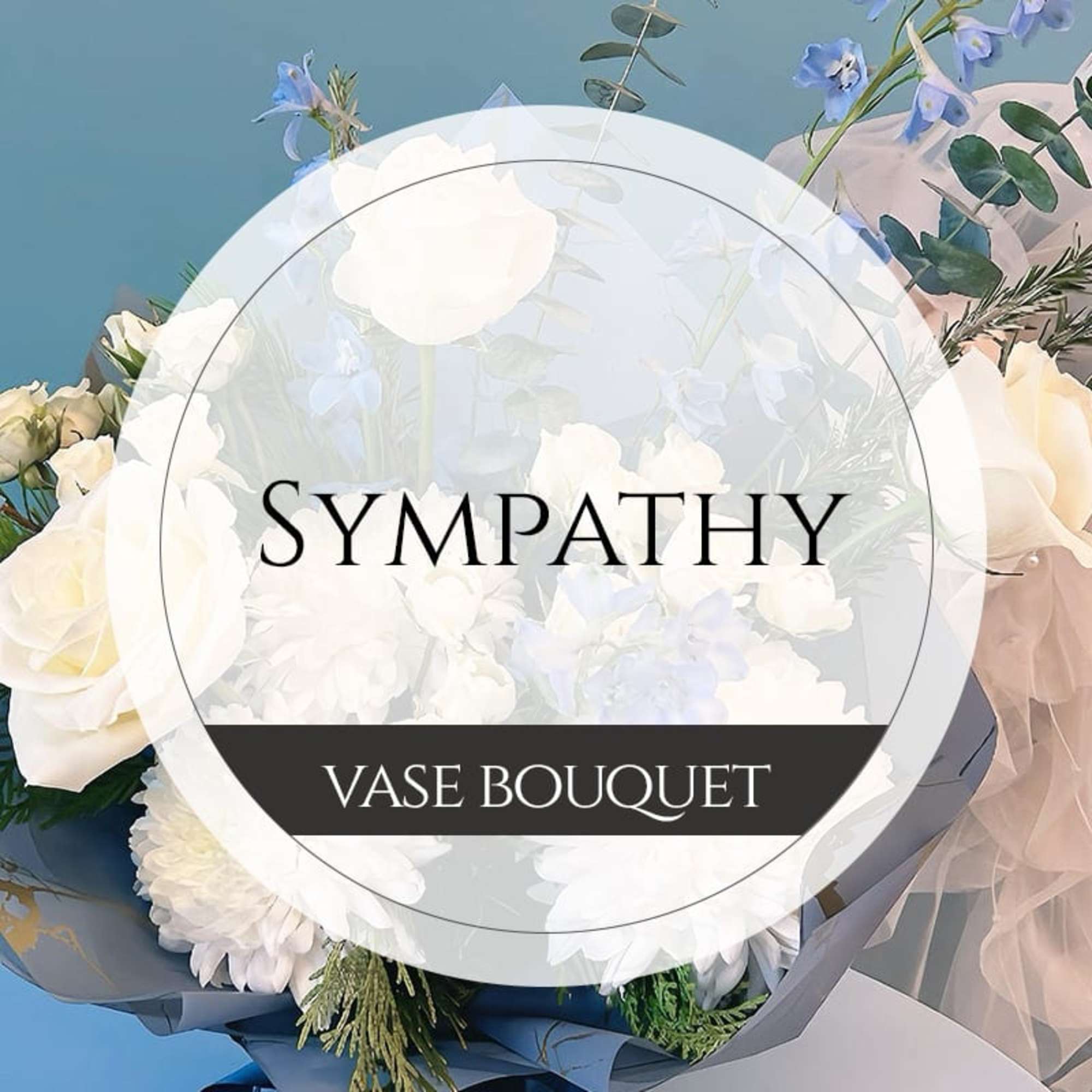 White sympathy bouquet with pale blue flowers and a vase wrap