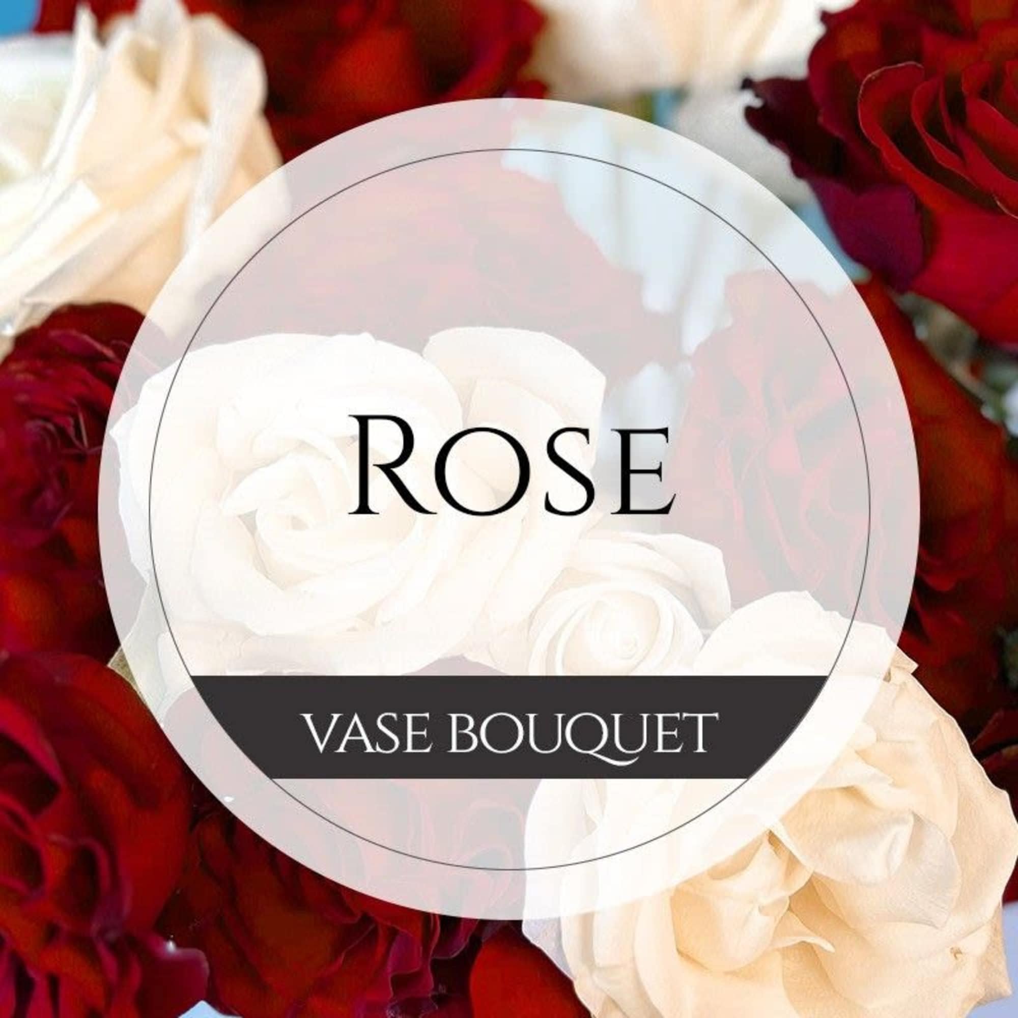 White and red roses in a vase bouquet