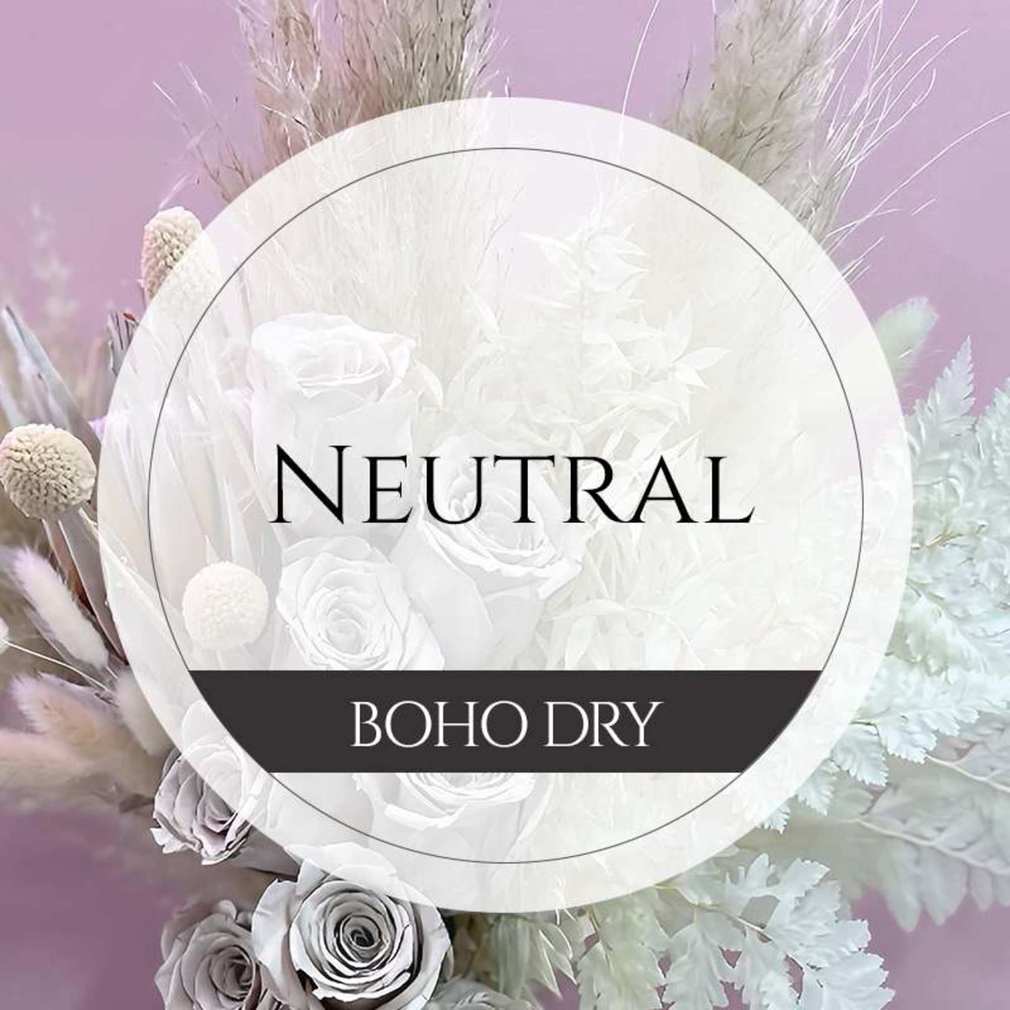 Neutral-toned dried floral arrangement with white roses and pampas grass