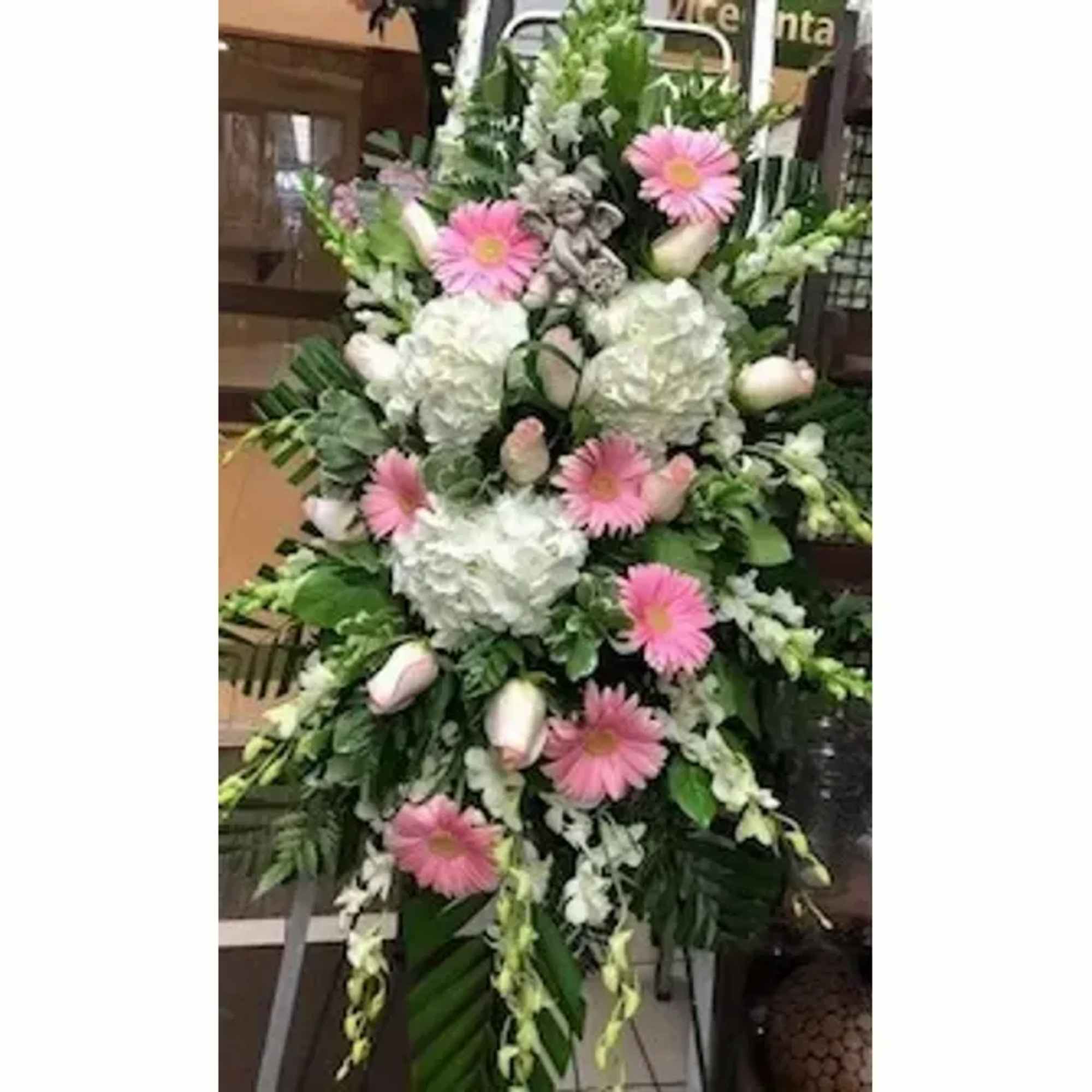Mixed Exotic Flowers Arranged In A Standing Spray.
