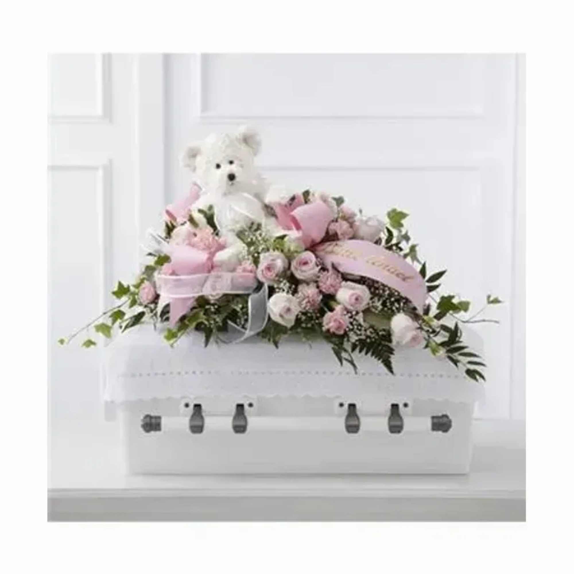 A tender spray of soft pink and white roses, carnations, daisies and