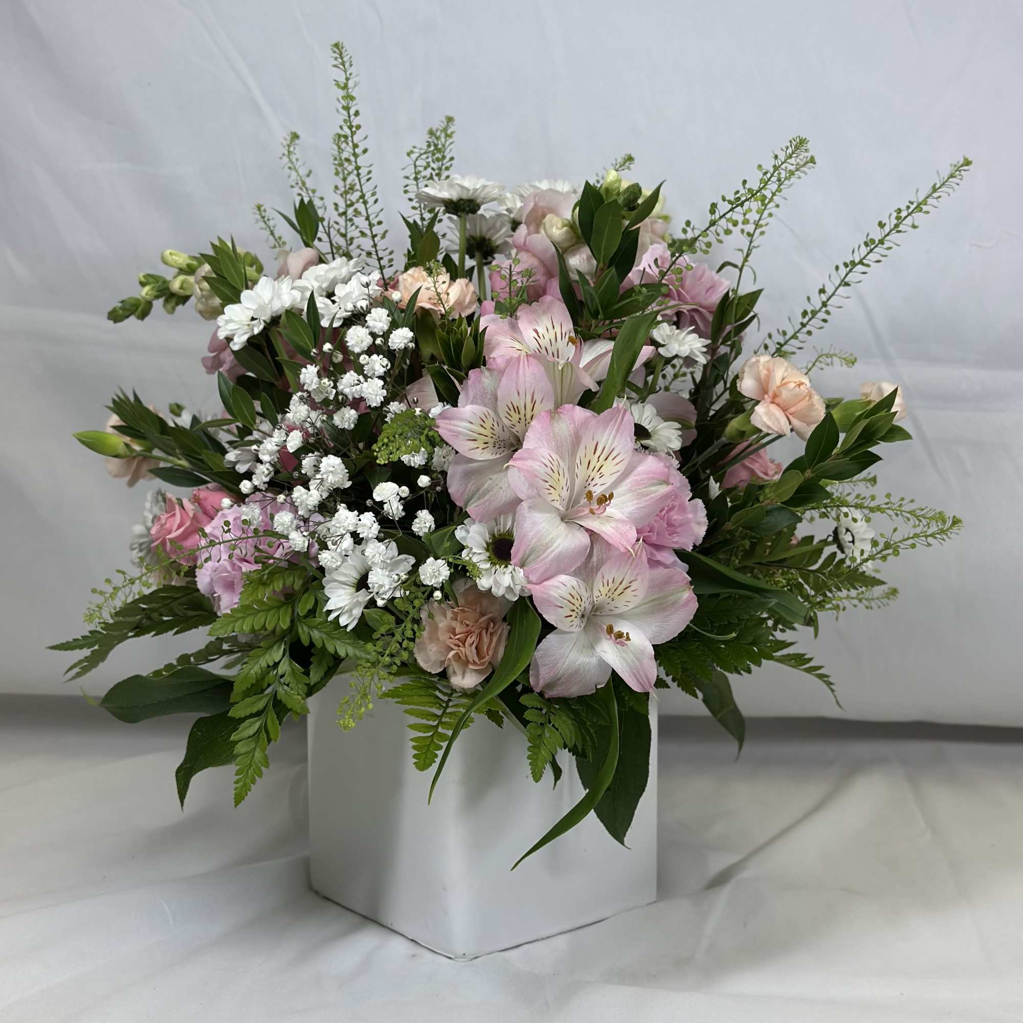 Lovely pink posies, with soft hues and gentle flowers are the hallmark