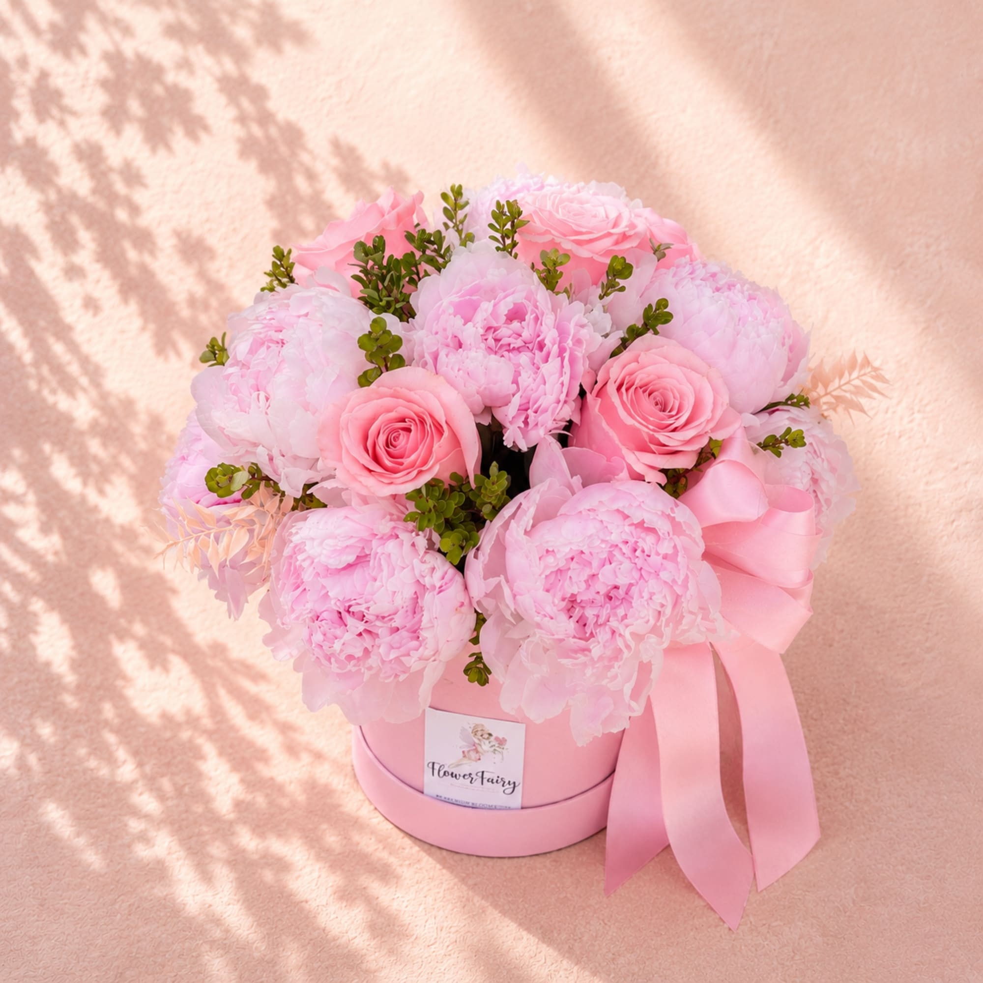 Inspired by Persephone, the Greek goddess of spring, this elegant arrangement celebrates