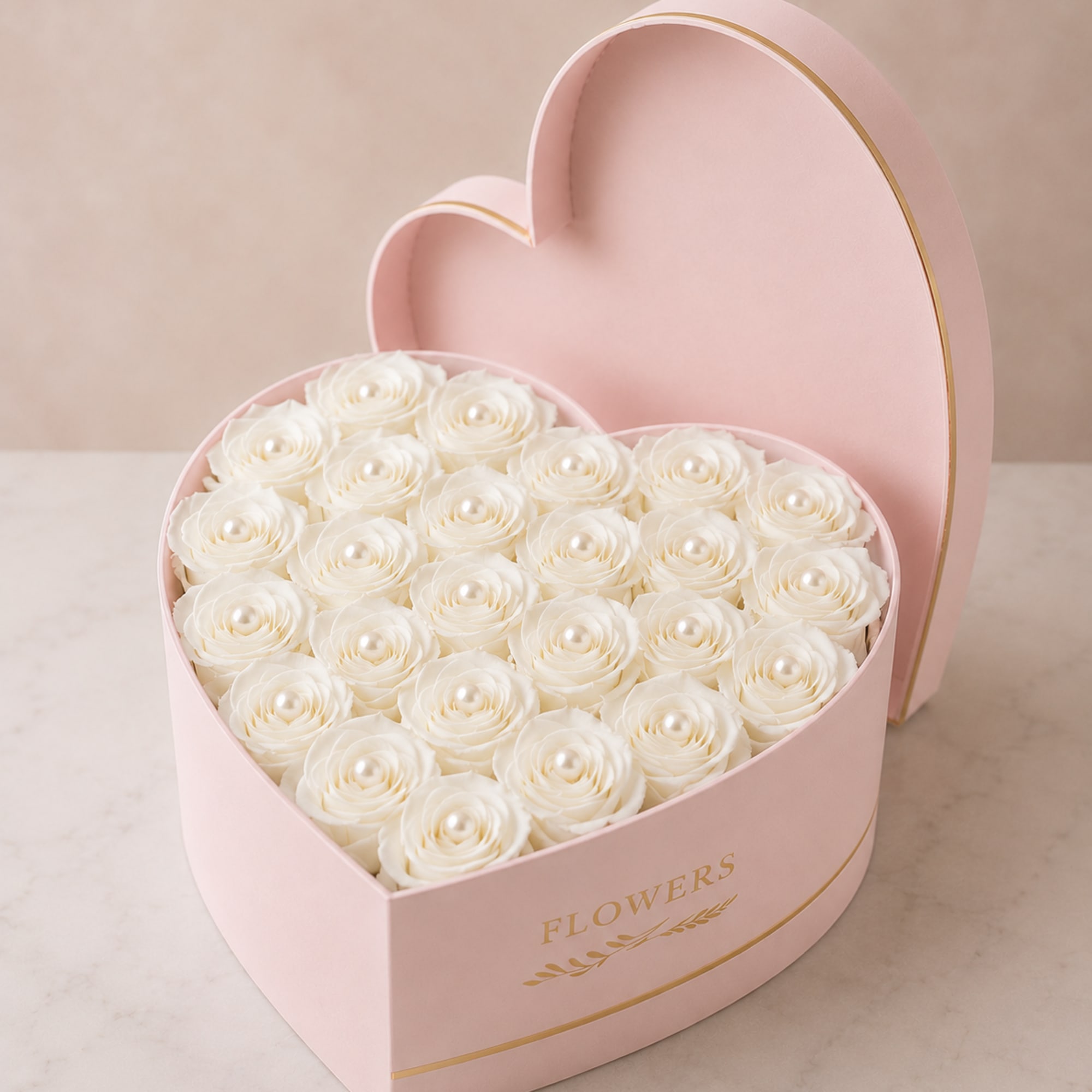 Tightly packed garden-white roses nestle inside a pale pink heart-shaped box edged