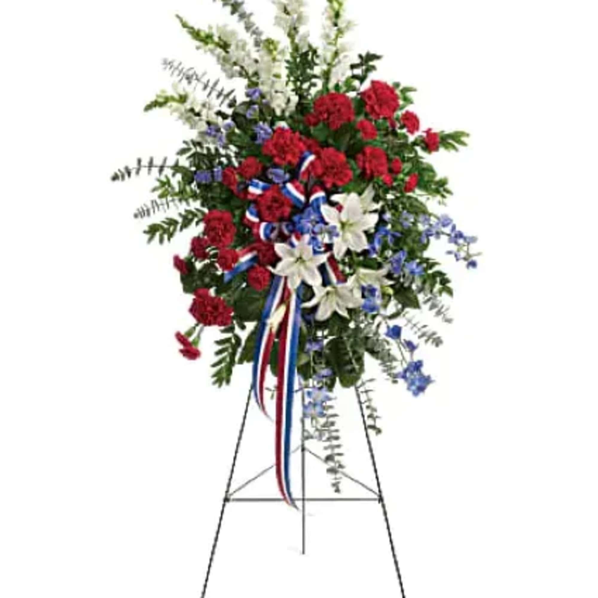 The perfect way to honor a veteran. This easel-mounted standing spray features