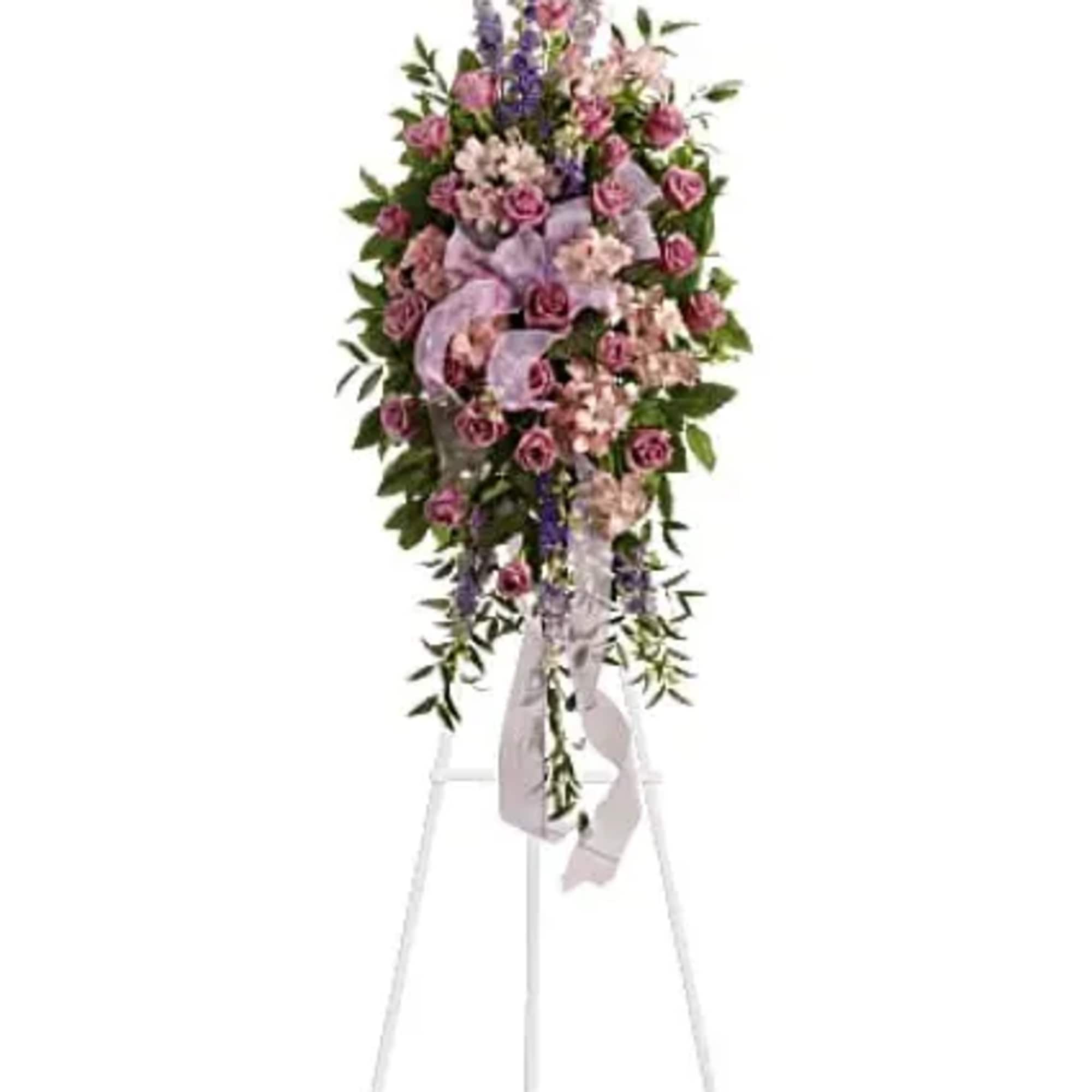This abundant spray of soft, feminine spring colors feels as calming as
