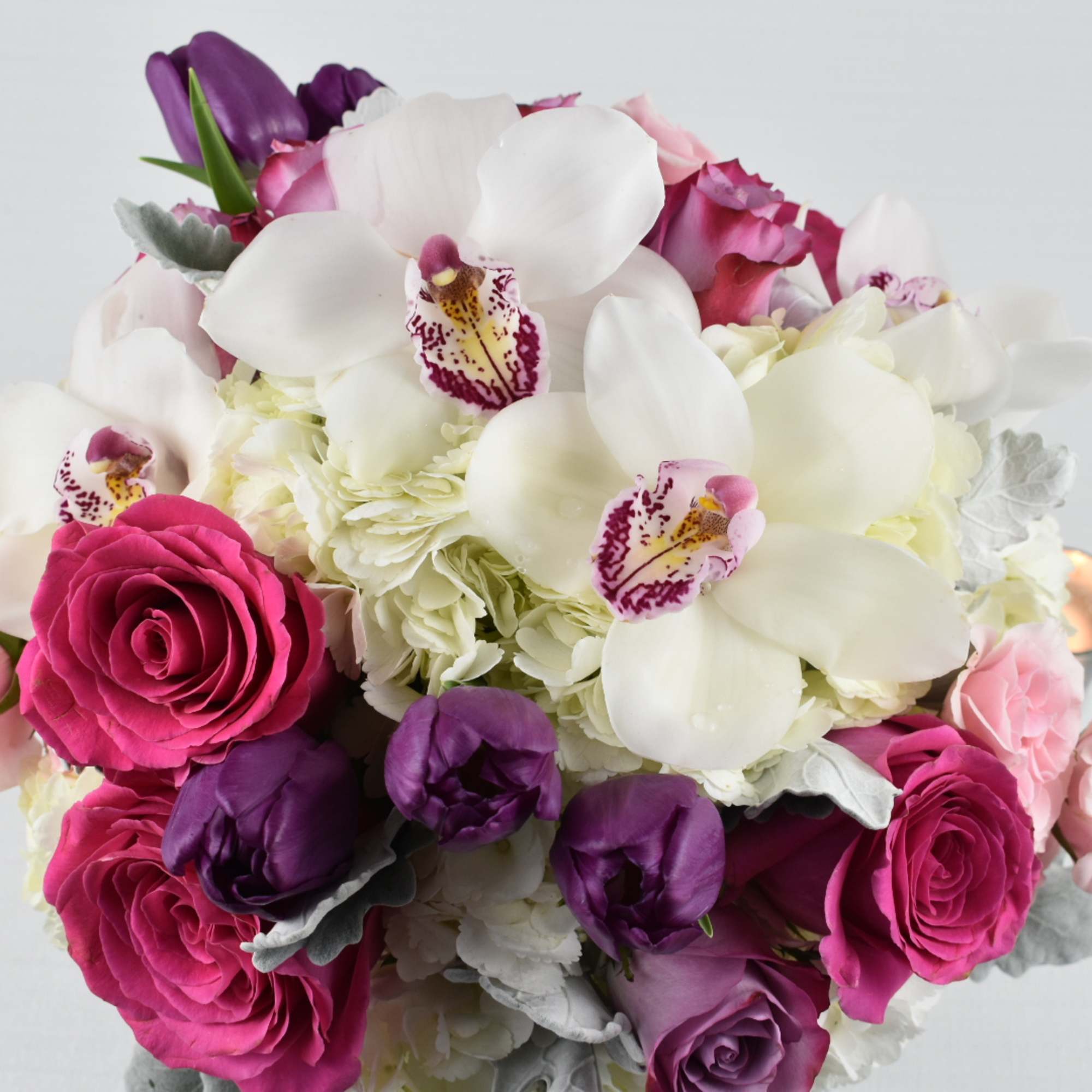 This lovely arrangement comes in a glass vase with dimensions 6X6 with